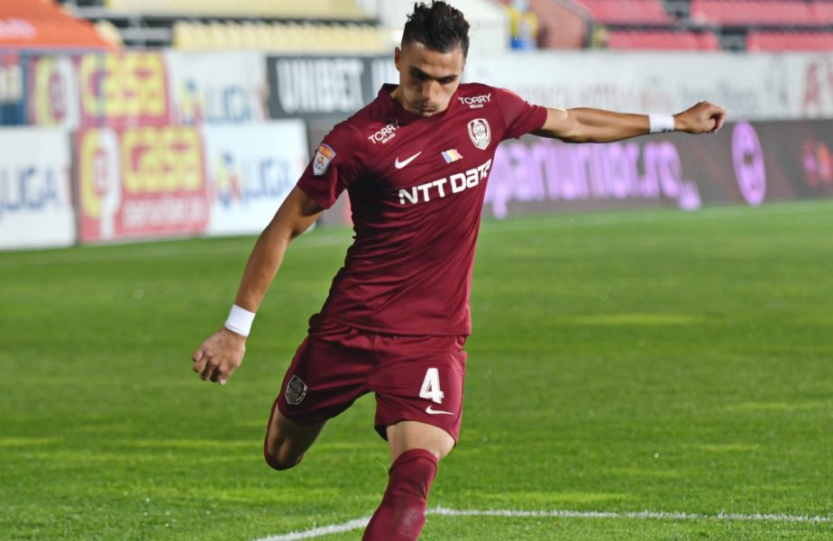 Cristi Manea lovește mingea în timpul unui meci dintre CFR Cluj și Voluntari