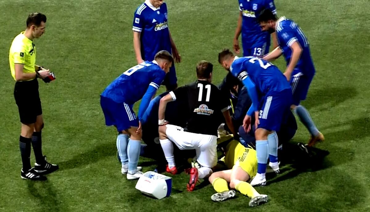 Imagini dramatice la Chiajna – FC U Craiova 0-0! Robert Popa, portarul Craiovei lui Mititelu, a fost umplut de sânge de un adversar