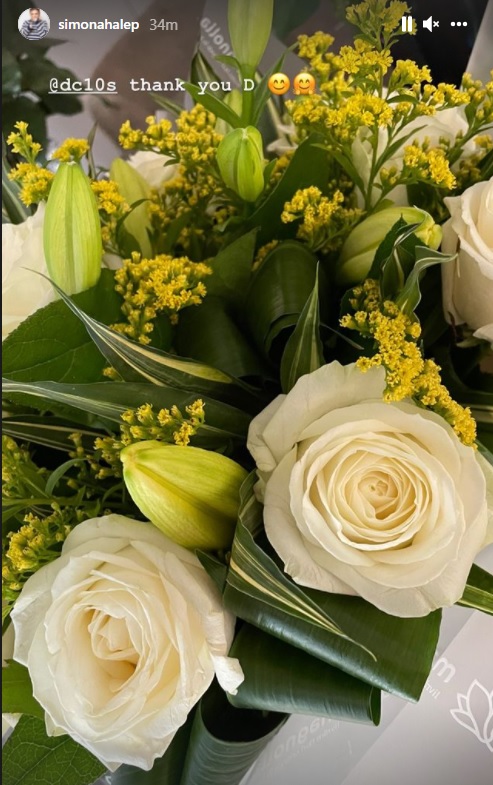 Simona Halep a primit flori de la Darren Cahill
