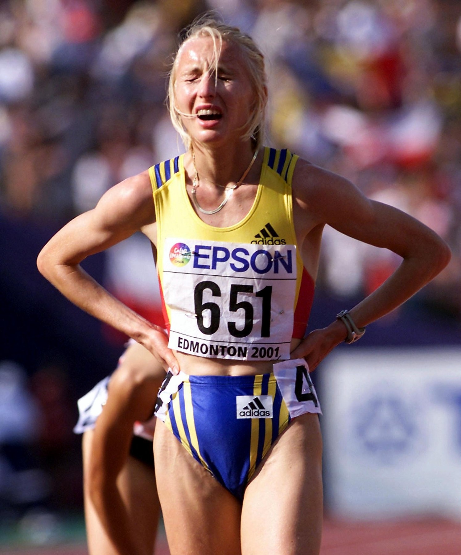 Gabriela Szabo of Romania agonizes over her 8th-place finish in the women's 5000M final at the 8th World Championships in Athletics 11 August 2001 in Commonwealth Stadium in Edmonton, Canada. Szabo's rival, Olga Yegorova of russia, won the gold medal in 15:03.39.,Image: 17497260, License: Rights-managed, Restrictions: , Model Release: no, Credit line: Profimedia