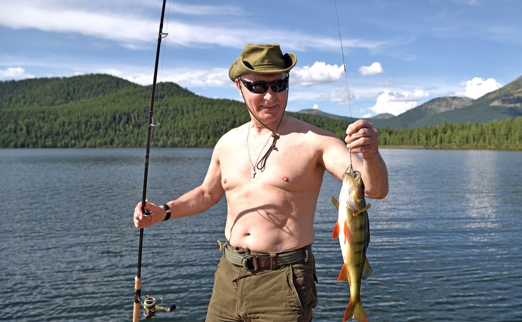 August 3, 2017 - Tyva, Tyva, Russia - Russian President Vladimir Putin holds a fish he caught fishing during a three-day fishing and hunting trip in the Siberian wilderness near the Mongolian border August 1-3, 2017 in the Tyva Republic, Russia.,Image: 344546402, License: Rights-managed, Restrictions: , Model Release: no, Credit line: Profimedia