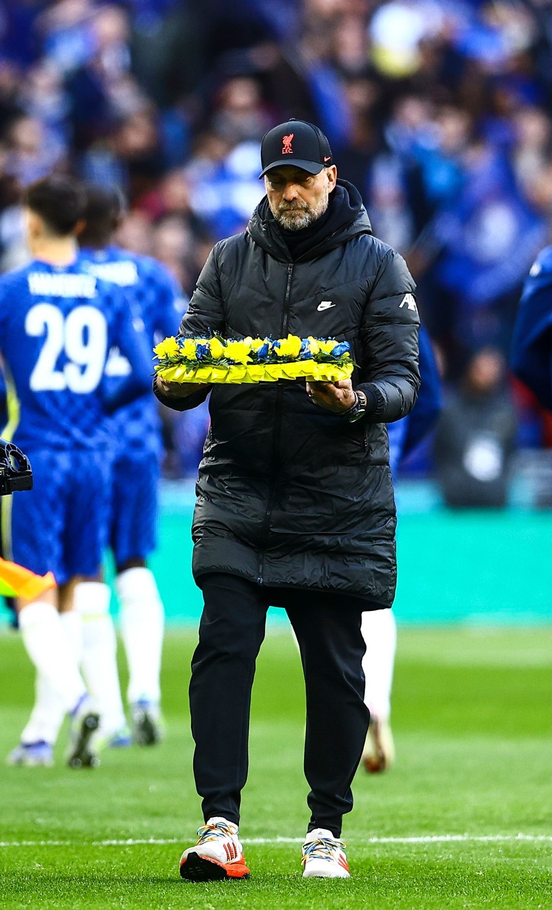 Jürgen Klopp manager of Liverpool hold a wreath in the colours of Ukraine
Chelsea v Liverpool, EFL Carabao Cup, Final, Football, Wembley Stadium, London, UK - 27 Feb 2022,Image: 665244232, License: Rights-managed, Restrictions: EDITORIAL USE ONLY No use with unauthorised audio, video, data, fixture lists, club/league logos or 