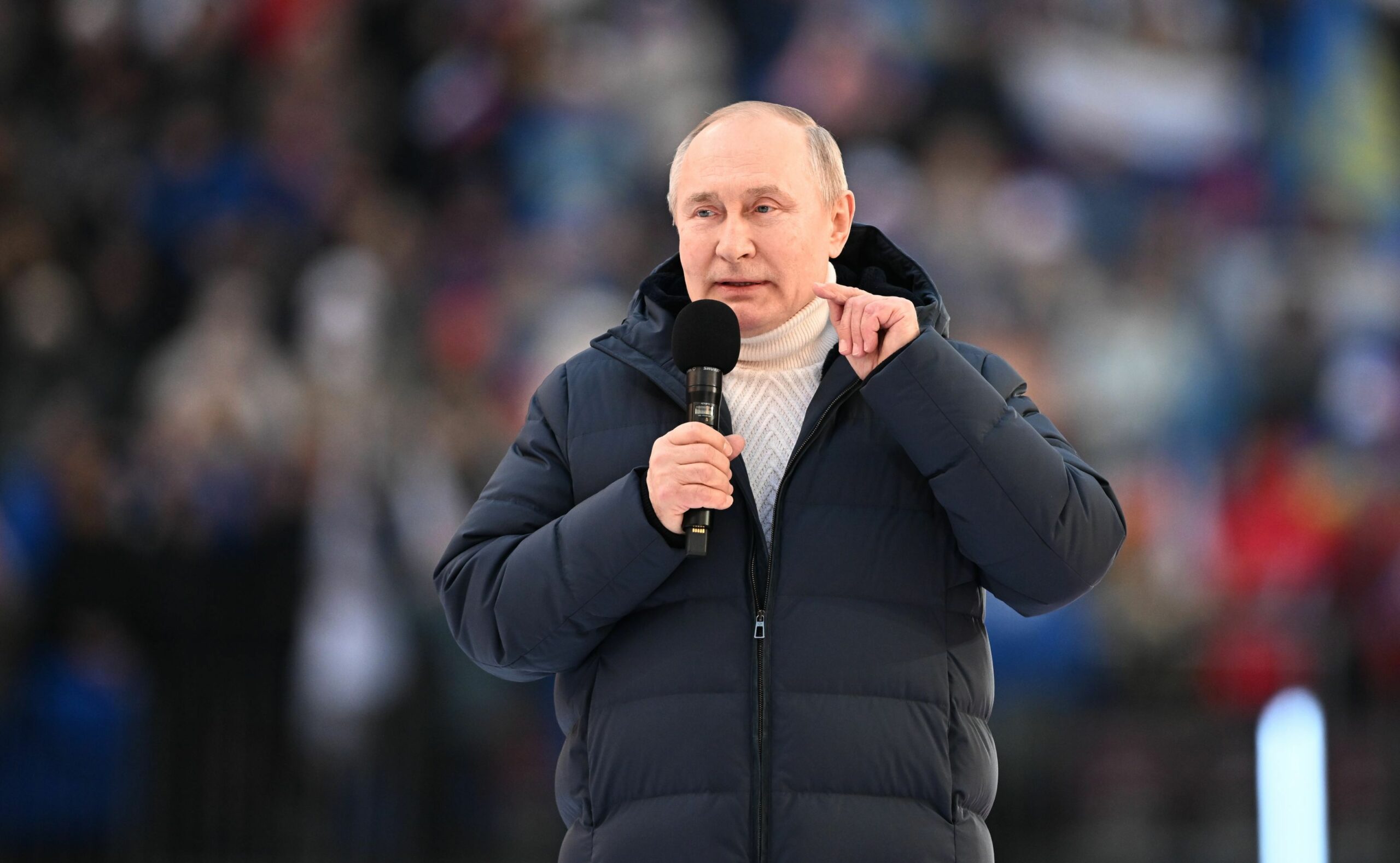 8143882 18.03.2022 Russian President Vladimir Putin addresses the audience during a concert marking the 8th anniversary of the referendum on the state status of Crimea and Sevastopol and its reunification with Russia, at Luzhniki Stadium in Moscow, Russia. Ramil Sitdikov / Sputnik