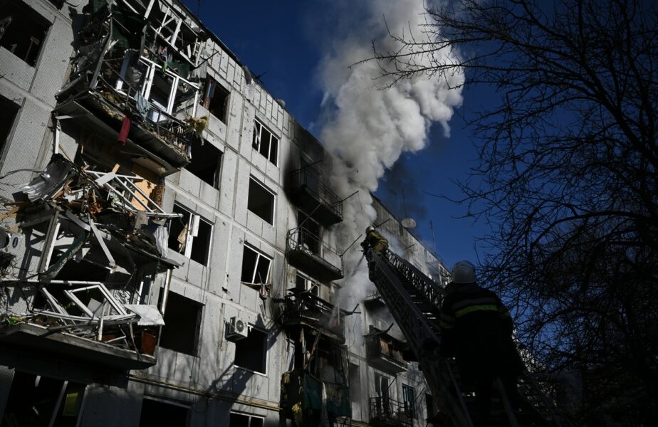 Firefighters work on a fire on a building after bombings on the eastern Ukraine town of Chuguiv on February 24, 2022, as Russian armed forces are trying to invade Ukraine from several directions, using rocket systems and helicopters to attack Ukrainian position in the south, the border guard service said. Russia's ground forces today crossed into Ukraine from several directions, Ukraine's border guard service said, hours after President Vladimir Putin announced the launch of a major offensive. Russian tanks and other heavy equipment crossed the frontier in several northern regions, as well as from the Kremlin-annexed peninsula of Crimea in the south, the agency said.,Image: 664616235, License: Rights-managed, Restrictions: , Model Release: no, Credit line: Profimedia