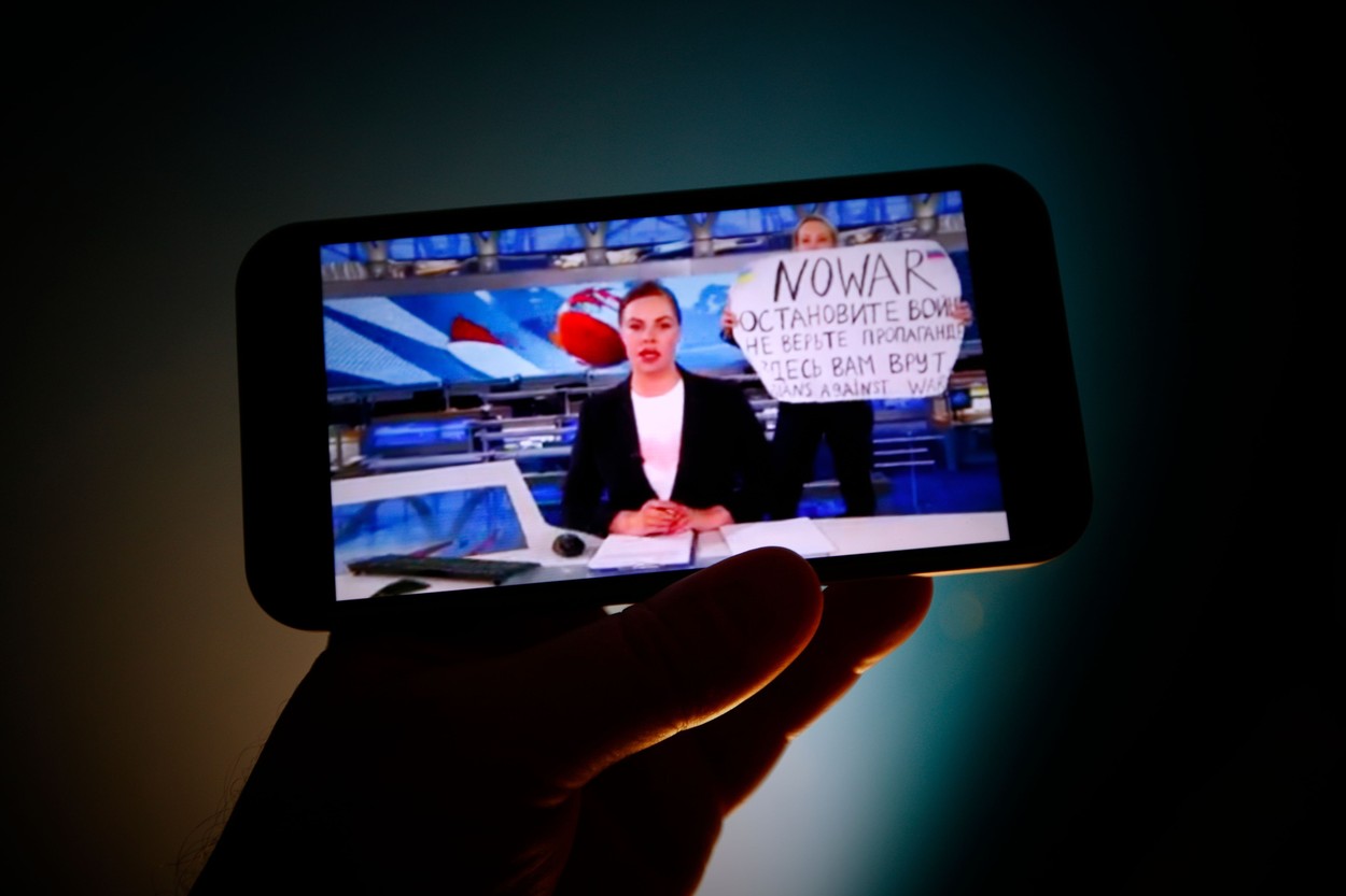 The evening news broadcast on the main Russian news channel, Channel 1 is seen on a mobile phone as it is interrupted by a woman protesting the war in Ukraine in this illustration photo on 15 March, 2022 in Warsaw, Poland. Marina Ovsyannikova, an employee of the network ran onto the stage with a sign reading 'No War' and 'They're lying to you here'.
Anti-War Protester On Russian News Broadcast, Warsaw, Poland - 14 Mar 2022,Image: 670288234, License: Rights-managed, Restrictions: RESTRICTED TO EDITORIAL USE, Model Release: no, Credit line: Profimedia