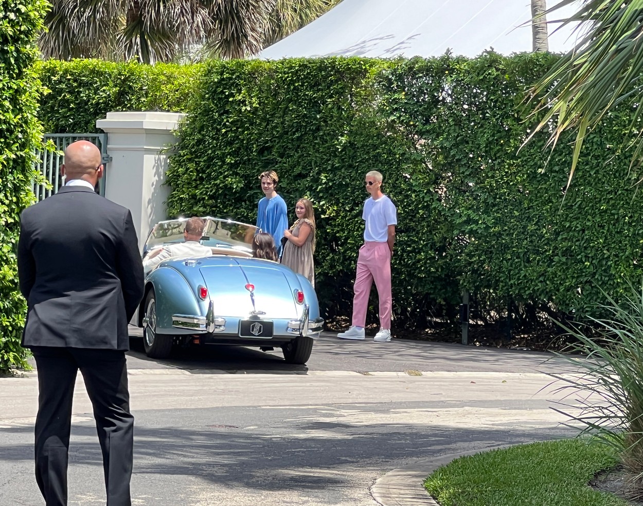 EXCLUSIVE: A very posh arrival! David and Victoria Beckham arrive for Sunday bunch in a classic car the morning after Brooklyn's wedding. 
The proud parents were greeted by Romeo , Cruz and Harper as they swept into to the Peltz familys stunning Florida pad in the fancy baby blue vehicle for day three of the star-studded wedding extravaganza.
The lavish brunch was being held at a huge marquee set up in sprawling tropical gardens out back of the residence, which was also the romantic setting for Friday eveningâ€™s rehearsal dinner. 
David and Victoriaâ€™s eldest son and actress Nicola tied the knot at her ultra wealthy familyâ€™s USD 76 million oceanfront estate.

Pictured: david beckham,victoria beckham,romeo,cruz,harper,Image: 681767091, License: Rights-managed, Restrictions: , Model Release: no, Pictured: david beckham,victoria beckham,romeo,cruz,harper, Credit line: Profimedia