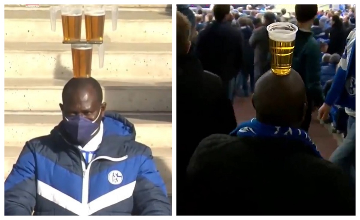 Imaginile anului vin din Germania! Un fan al lui Schalke a făcut show. Şi-a folosit telefonul pentru a ţine trei pahare de bere pe cap