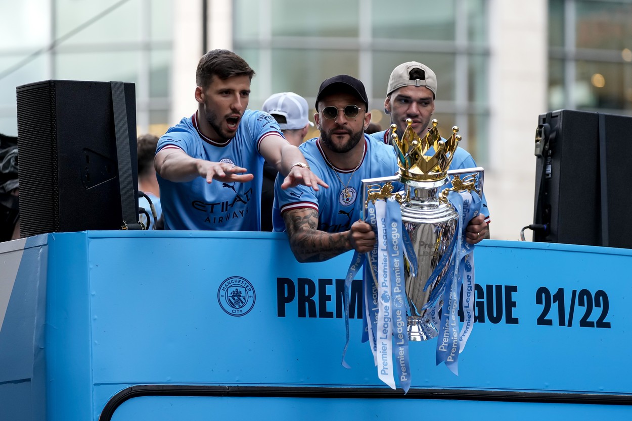 single club/league/player publications/services.

Rodri, Kyle Walker and Ederson of Manchester City celebrate their Premier League title win during the open top bus parade
Manchester City Champions Bus Parade, UK - 23 May 2022,Image: 693855887, License: Rights-managed, Restrictions: EDITORIAL USE ONLY No use with unauthorised audio, video, data, fixture lists (outside the EU), club/league logos or 