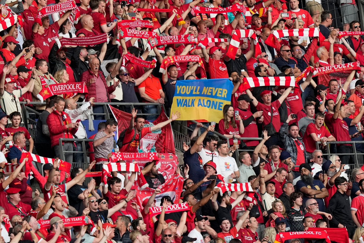 Liverpool fans hold up scarves and a You'll Never Walk Alone Ukrain Flag
Liverpool v Real Madrid, UEFA Champions League Final, Football, Stade de France, Saint-Denis Paris, France - 28 May 2022,Image: 695304084, License: Rights-managed, Restrictions: , Model Release: no, Credit line: Profimedia