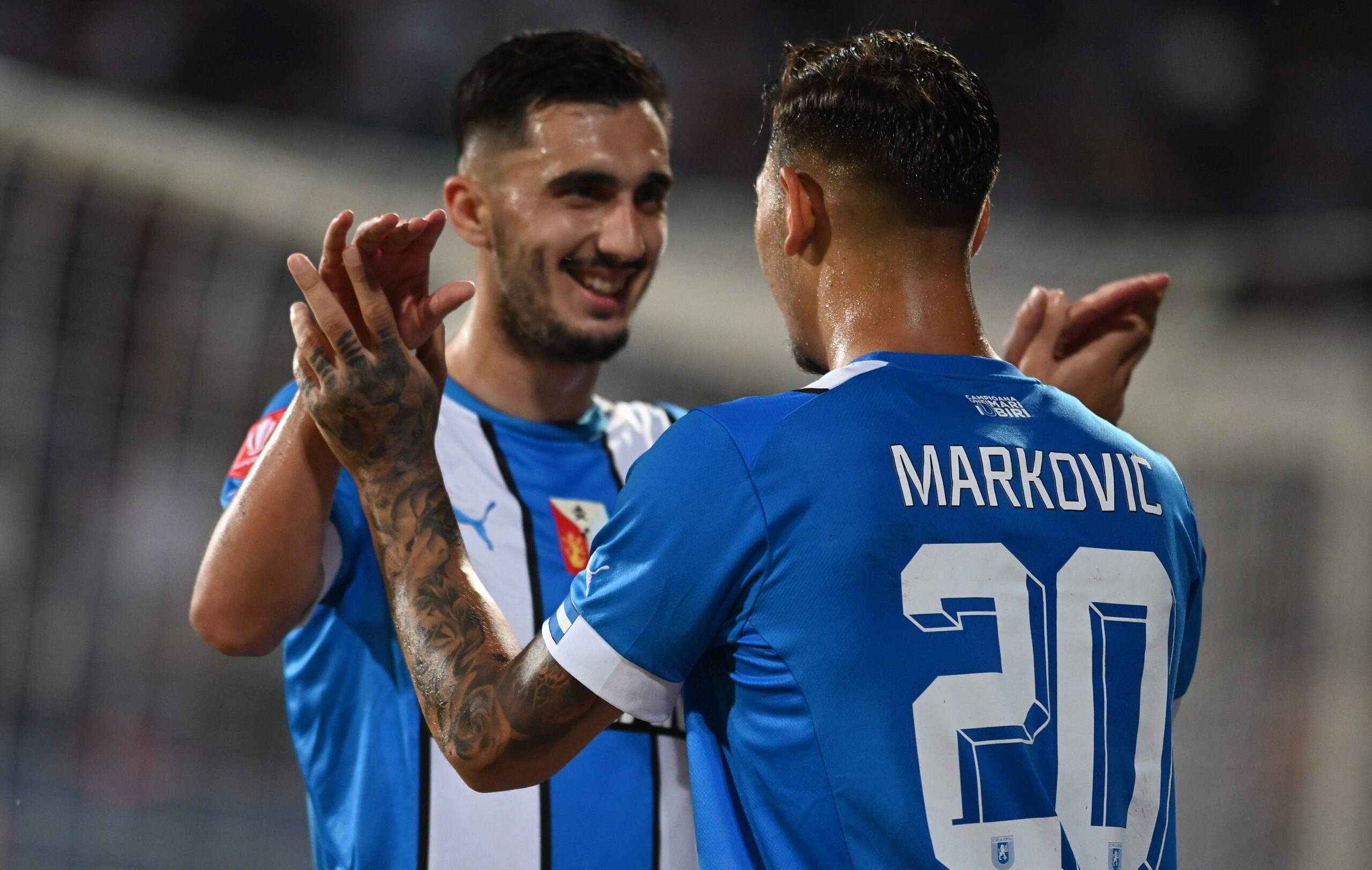 Ivan și Markovic sărbătoresc un gol marcat de Universitatea Craiova