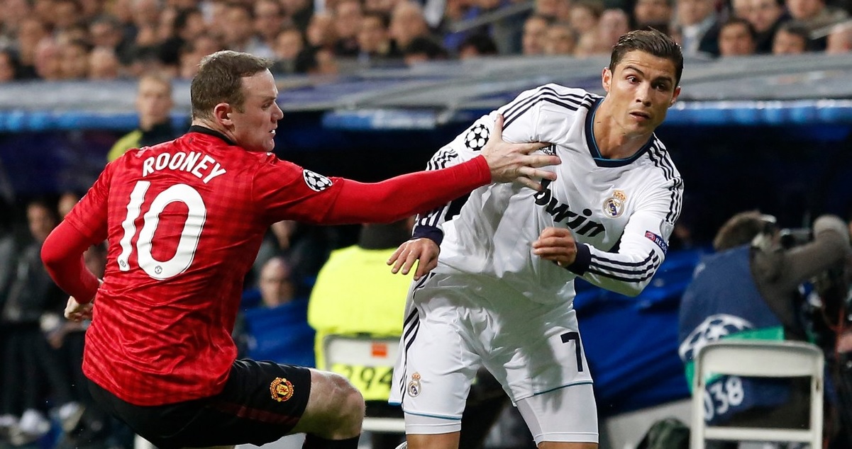 Cristiano Ronaldo și Wayne Rooney, adversari într-un meci între Manchester United și Real Madrid