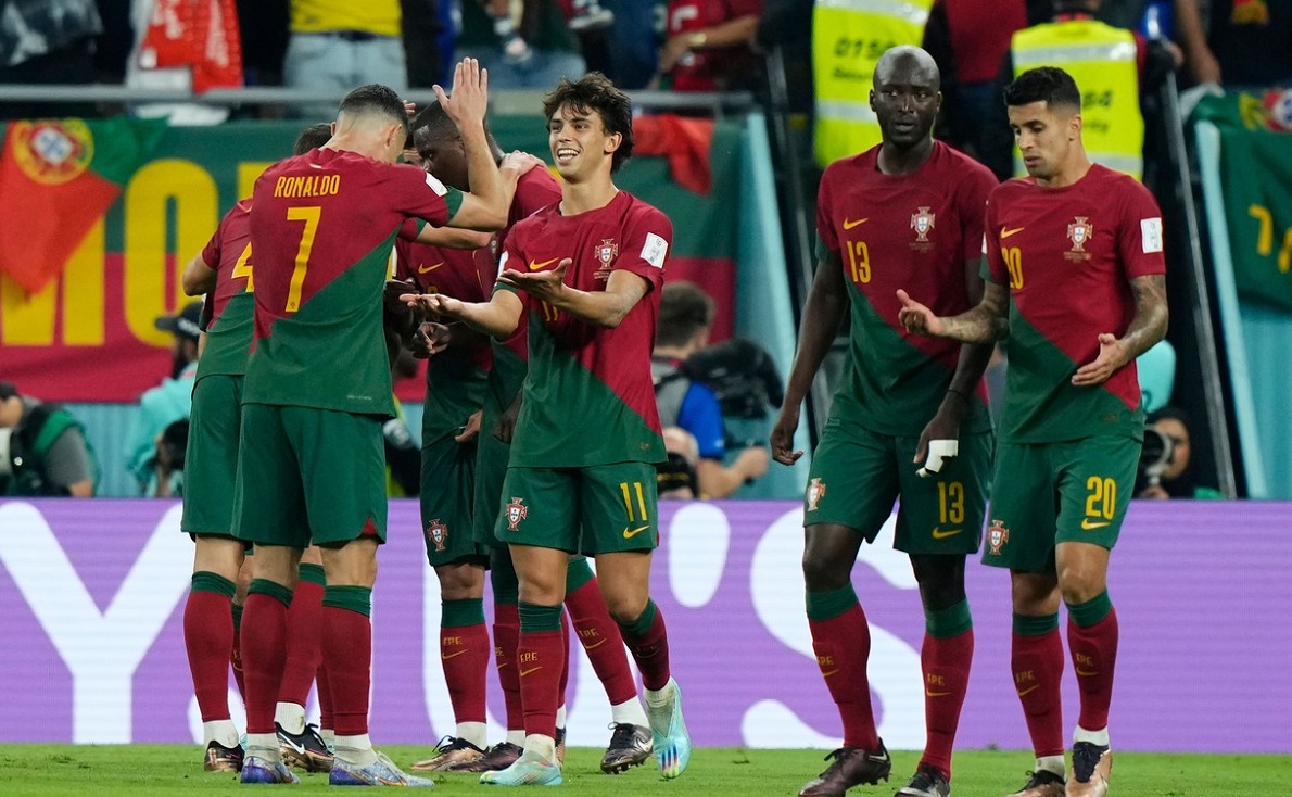 Jucătorii Portugalia, în timpul partidei cu Ghana