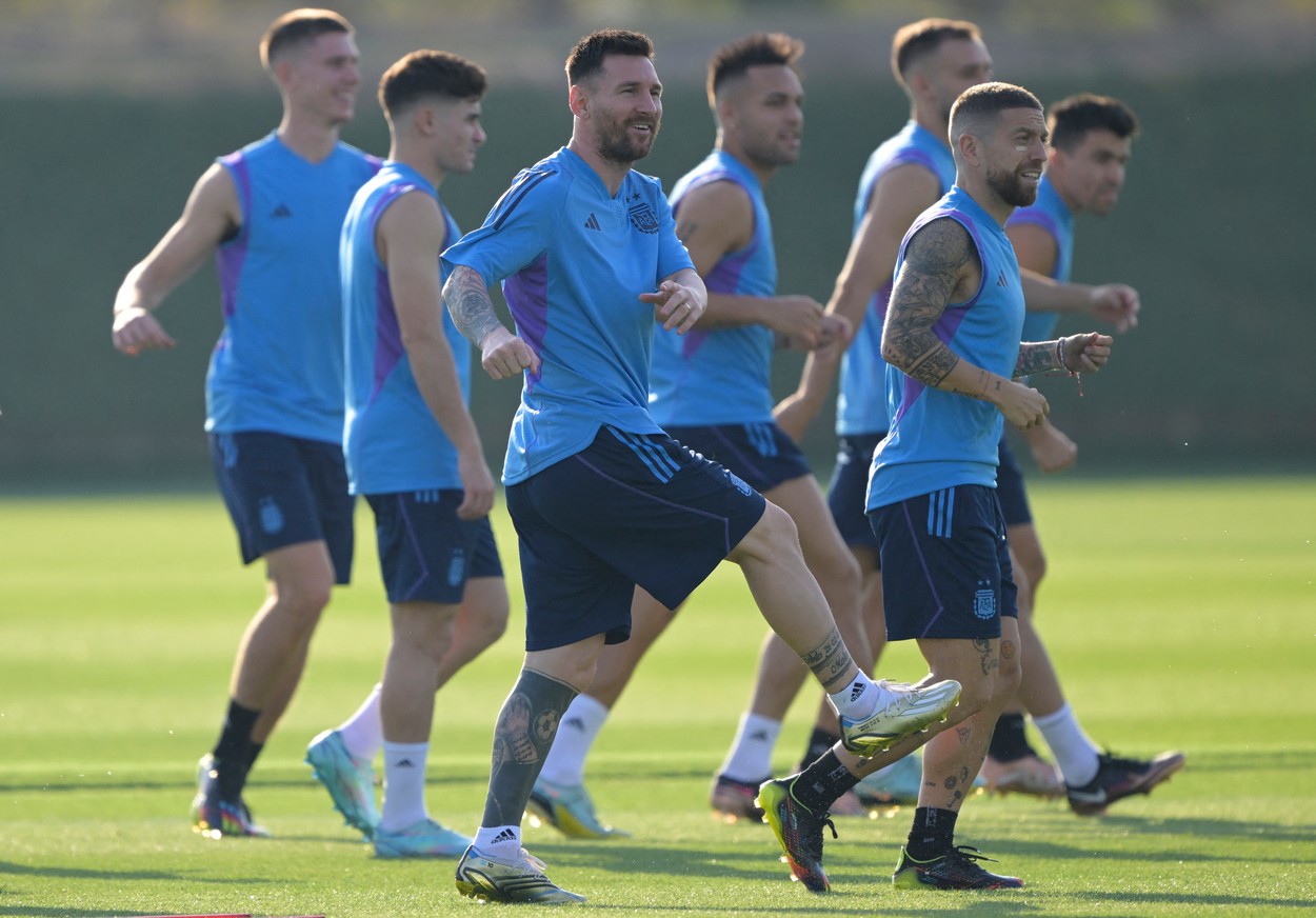 Argentina's forward Lionel Messi (3rd L) and Argentina's midfielder Alejandro Gomez (2nd R) take part with teammates in a training session at the Qatar University Training Site in Doha, on November 21, 2022, on the eve of the Qatar 2022 World Cup football match between Argentina and Saudi Arabia.,Image: 739112050, License: Rights-managed, Restrictions: , Model Release: no