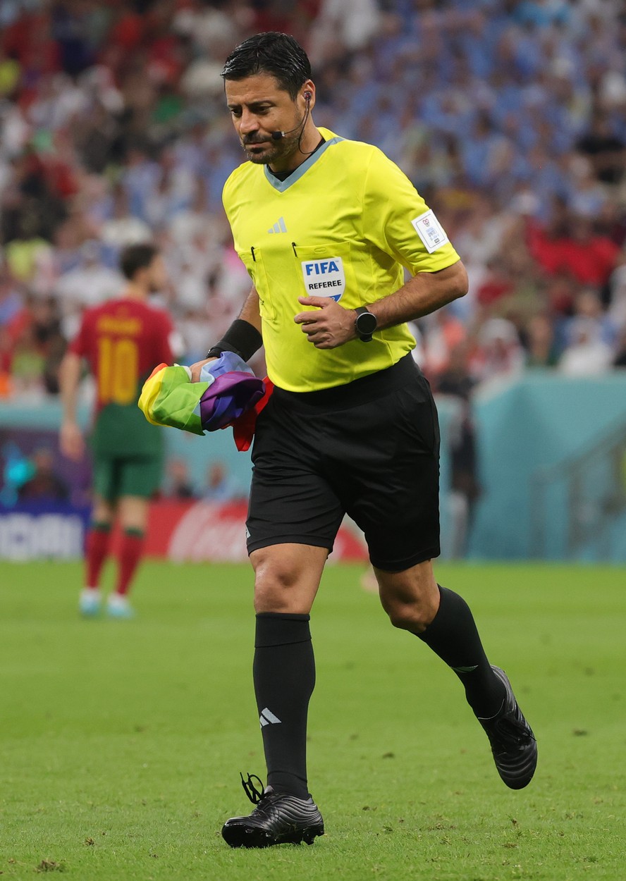 referee pictured with a LGBTQ flag during a soccer game between Portugal and Uruguay, in Group H of the FIFA 2022 World Cup in Lusail Stadium, in Lusail, State of Qatar on Monday 28 November 2022.
Soccer World Cup 2022 Portugal Vs Uruguay, Lusail, Qatar - 28 Nov 2022,Image: 740788702, License: Rights-managed, Restrictions: , Model Release: no