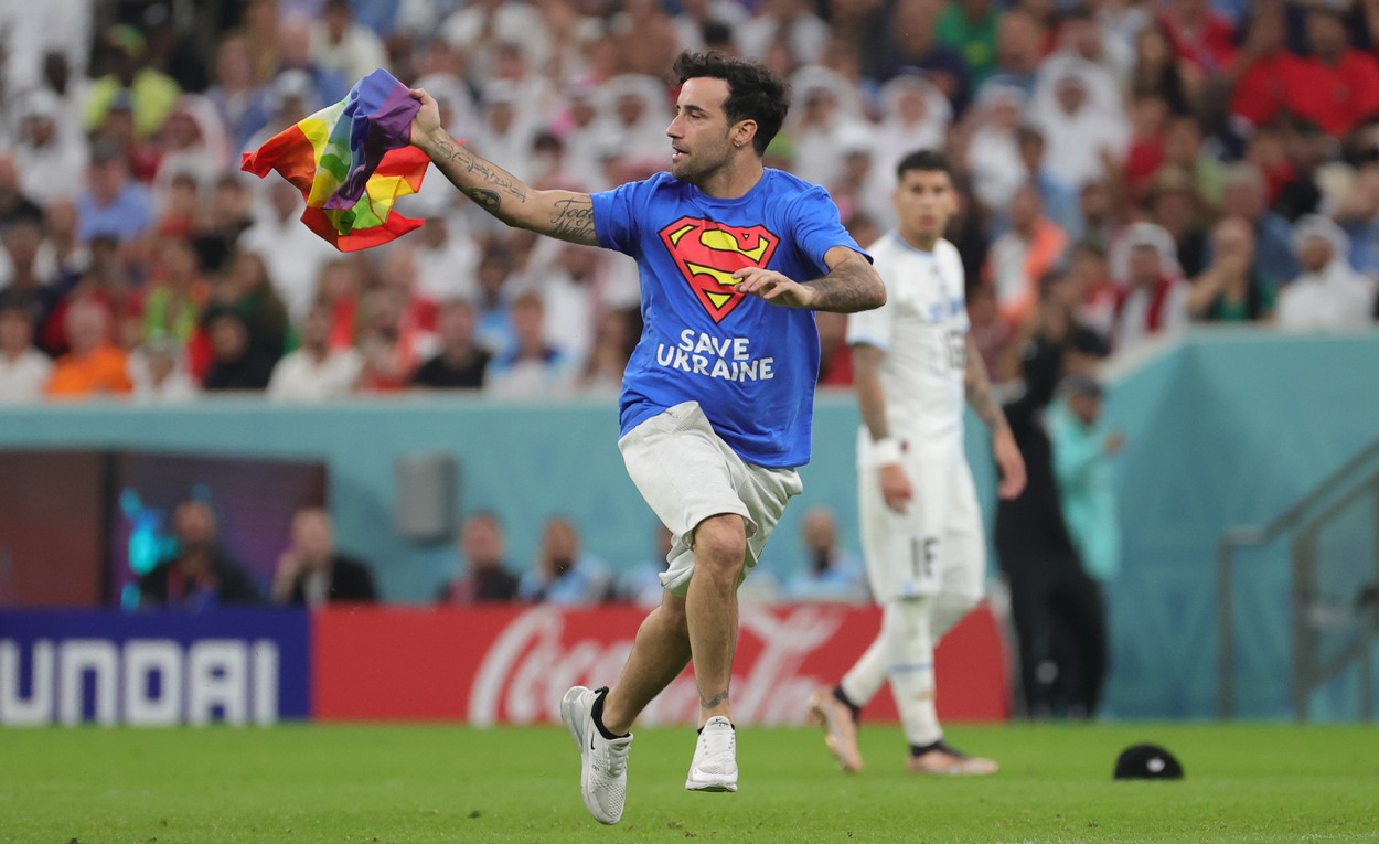 A streaker with a tee-shirt of superman saying save Ukraine, runs on the field  during a soccer game between Portugal and Uruguay, in Group H of the FIFA 2022 World Cup in Lusail Stadium, in Lusail, State of Qatar on Monday 28 November 2022.
Soccer World Cup 2022 Portugal Vs Uruguay, Lusail, Qatar - 28 Nov 2022,Image: 740788730, License: Rights-managed, Restrictions: , Model Release: no