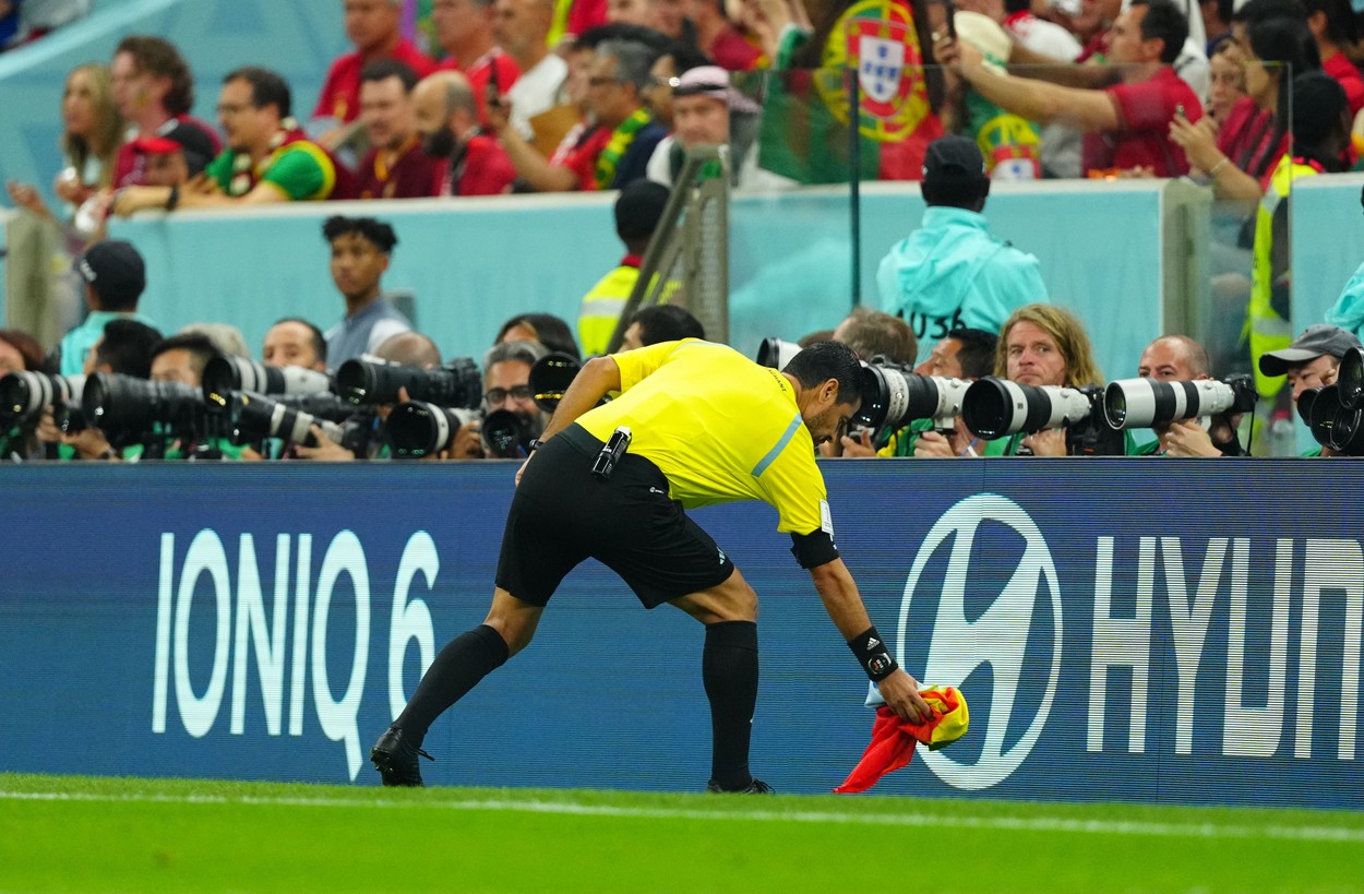 Referee Mr Faghani Aliireza of Iran puts down the rainbow flag at the side of the pitch.
Portugal v Uruguay, FIFA World Cup 2022, Group H, Football, Lusail Stadium, Al Daayen, Qatar - 28 Nov 2022,Image: 740789415, License: Rights-managed, Restrictions: Editorial Use Only, Model Release: no