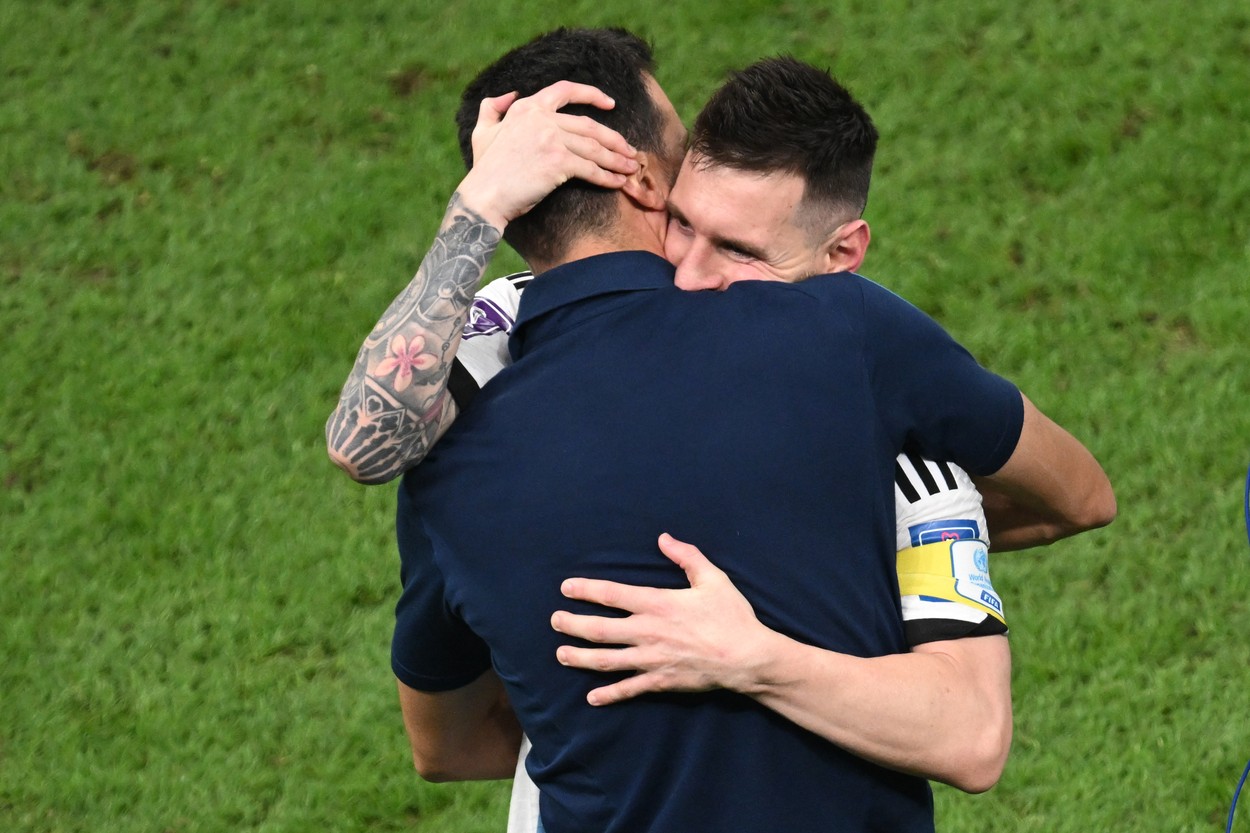 13 December 2022, Qatar, Lusail: Soccer, World Cup, Argentina - Croatia, final round, semifinal, Lusail Stadium, Argentina's Lionel Messi hugs Argentina's coach Lionel Scaloni after the match.,Image: 744422732, License: Rights-managed, Restrictions: , Model Release: no