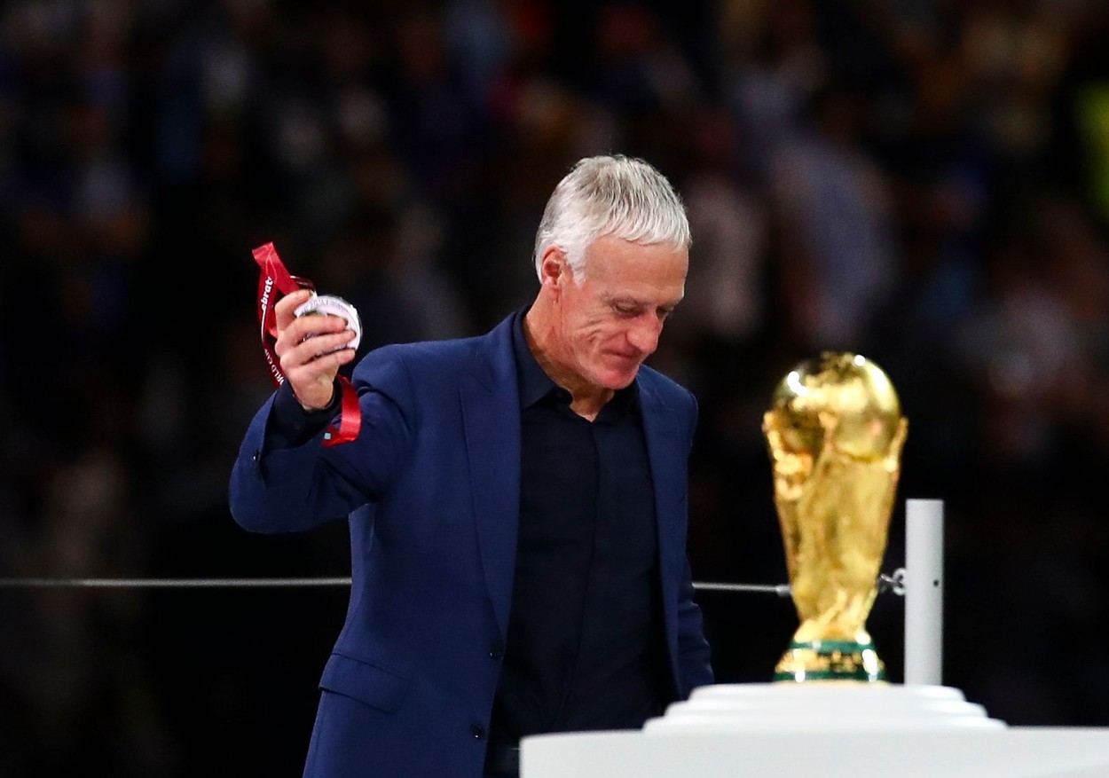 Didier Deschamps manager of France removes his runners up medal
Argentina v France, FIFA World Cup 2022, Final, Football, Lusail Stadium, Al Daayen, Qatar - 18 Dec 2022,Image: 745417453, License: Rights-managed, Restrictions: Editorial Use Only, Model Release: no