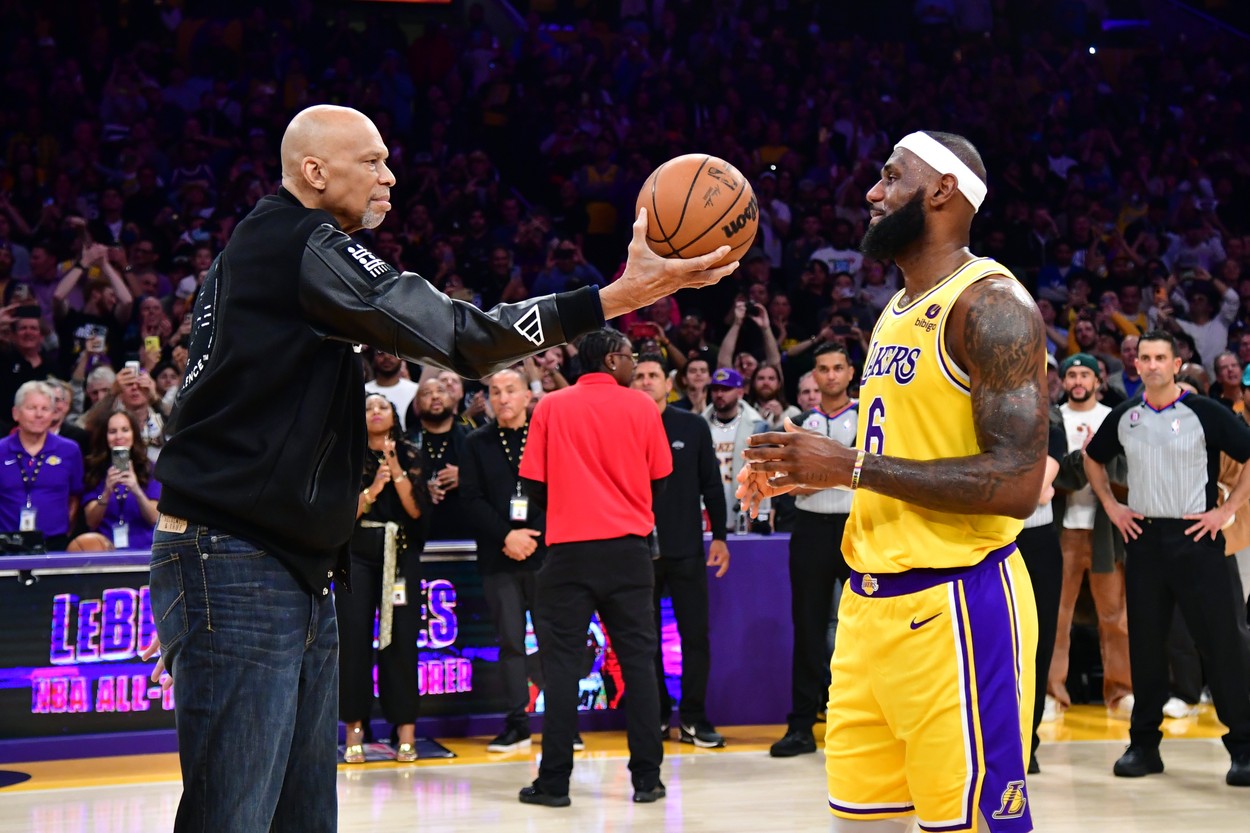 Feb 7, 2023; Los Angeles, California, USA; Los Angeles Lakers forward LeBron James (6) takes a ball from Kareem Abdul-Jabbar after breaking the record for all-time scoring in the NBA during the third quarter against the Oklahoma City Thunder at Crypto.com Arena.,Image: 754751585, License: Rights-managed, Restrictions: , Model Release: no