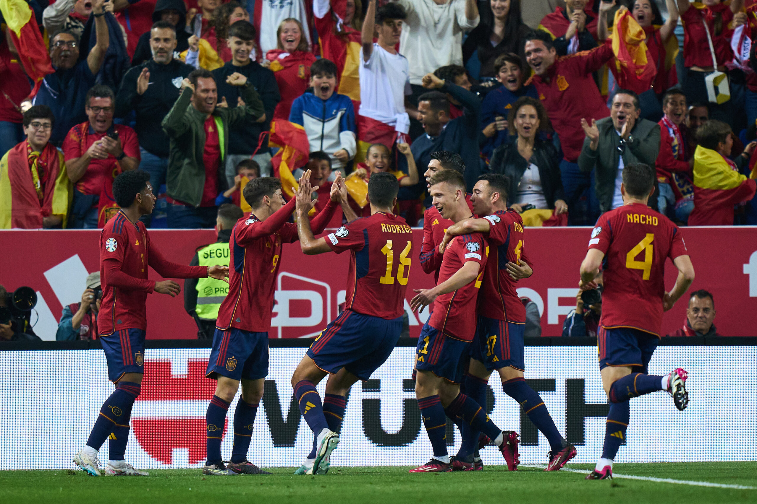 MALAGA, SPAIN - MARCH 25: Dani Olmo of Spain celebrates with teammates after scoring the team's first goal during the UEFA EURO 2024 qualifying round group A match between Spain and Norway at La Rosaleda Stadium on March 25, 2023 in Malaga, Spain. (Photo by Angel Martinez/Getty Images)