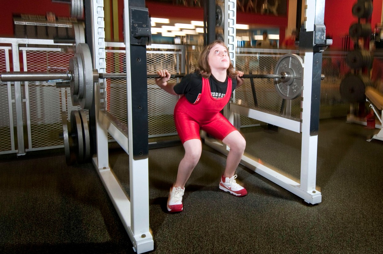 - (PICTURED Naomi Kutin in the gym) A primary school girl has smashed a world weightlifting record - by hoisting more than TWO TIMES her own body weight. Naomi Kutin, 10, claimed the astonishing record after squatting 215 pounds - despite weighing just under 93 pounds herself. She lifted the huge weight - which weighs the same as Mike Tyson in his prime - in front of a packed crowd cheering her on. The schoolgirl - who is only in 5th grade - stunned onlookers by claiming the womens world record, out doing the previous holder - a 44-year-old. .,Image: 121935850, License: Rights-managed, Restrictions: It is not permitted to use or publish this image in a way which does not reflect a fair and true representation of the original context or in a manner which might be defamatory to any person or body or which is likely to bring the image Caters News or its licensees into disrepute., Model Release: no