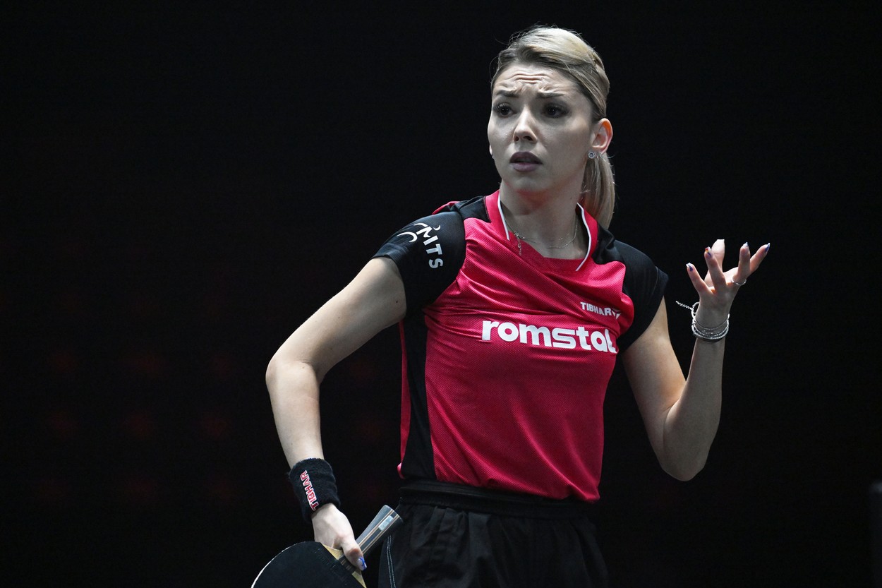 SINGAPORE, March 11, 2023  -- Bernadette Szocs of Romania reacts during the women's singles round of 64 match against Wang Yidi of China at the World Table Tennis (WTT) Singapore Smash in Singapore on March 11, 2023.,Image: 762011672, License: Rights-managed, Restrictions: , Model Release: no