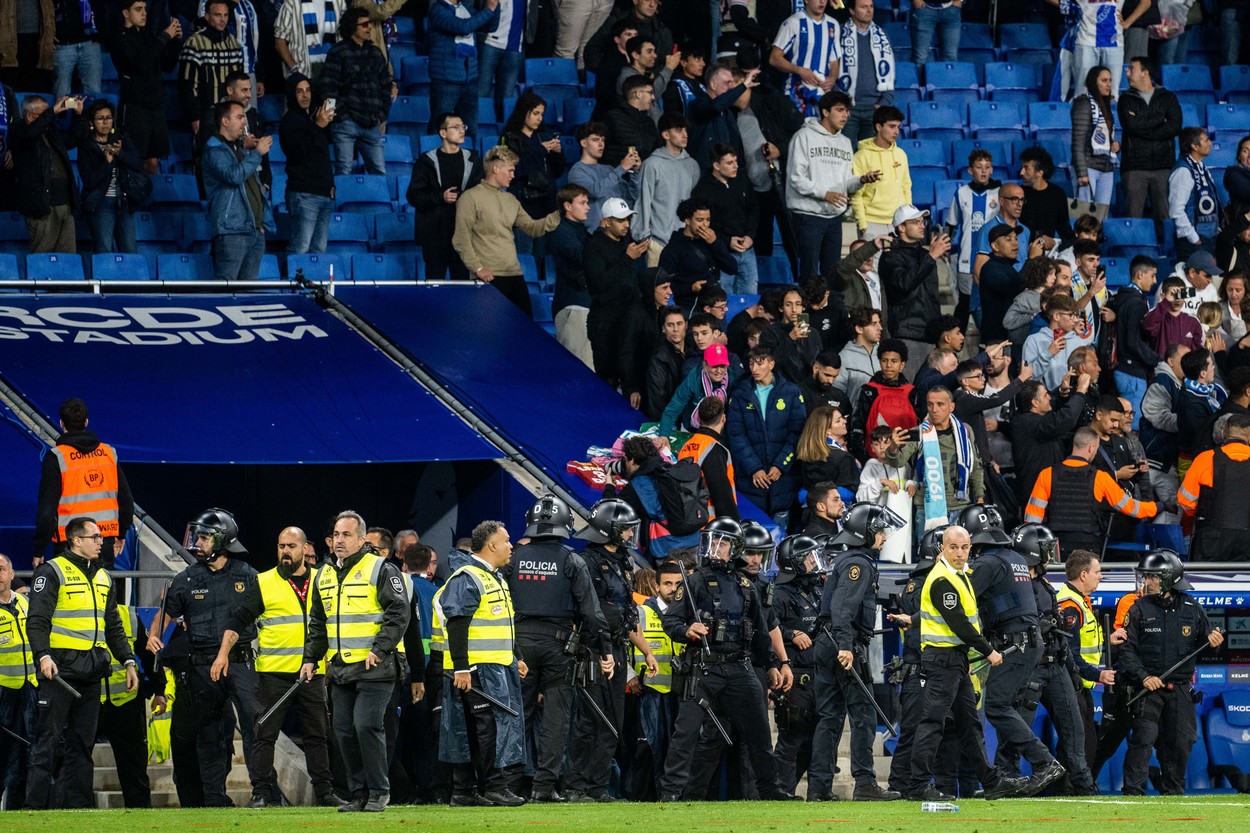 Espanyol fans invade the field and are evicted by the Mossos de Esquadra Espanyol fans invade the field and are evicted by the Mossos de Esquadra during the spanish league, La Liga Santander, football match played between RCD Espanyol and FC Barcelona  at RCD Stadium on May 14, 2023, in Barcelona, Spain.
RCD Espanyol v FC Barcelona  - La Liga Santander, Spain - 14 May 2023,Image: 775878009, License: Rights-managed, Restrictions: , Model Release: no