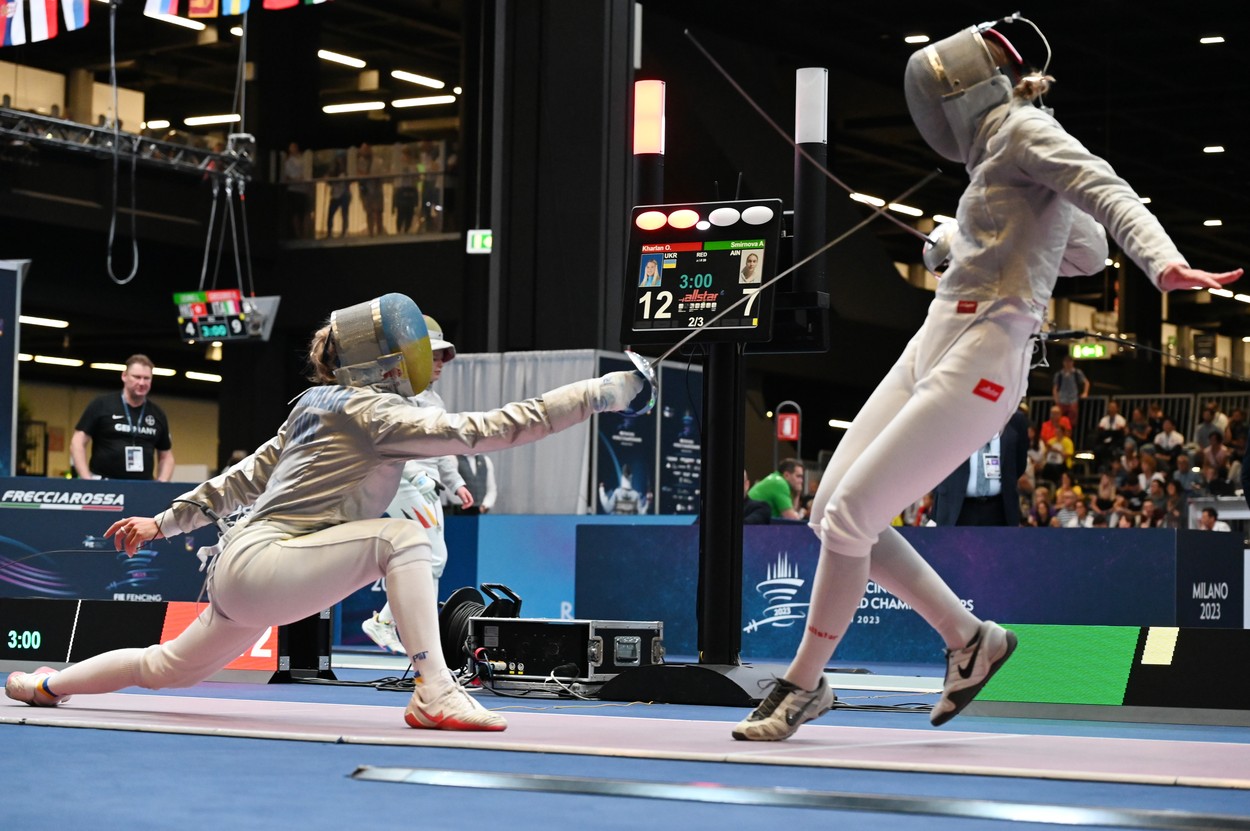 Olga Kharlan of Ukraine (L) fights against Anna Smirnova of Russia, registered as an Individual Neutral Athlete (AIN), during the 2023 FIE Fencing World Championship Women's Sabre 1st round match in Milano, Italy on July 27, 2023. (Photo by Tadashi MIYAMOTO),Image: 792340587, License: Rights-managed, Restrictions: No third party sales, Model Release: no