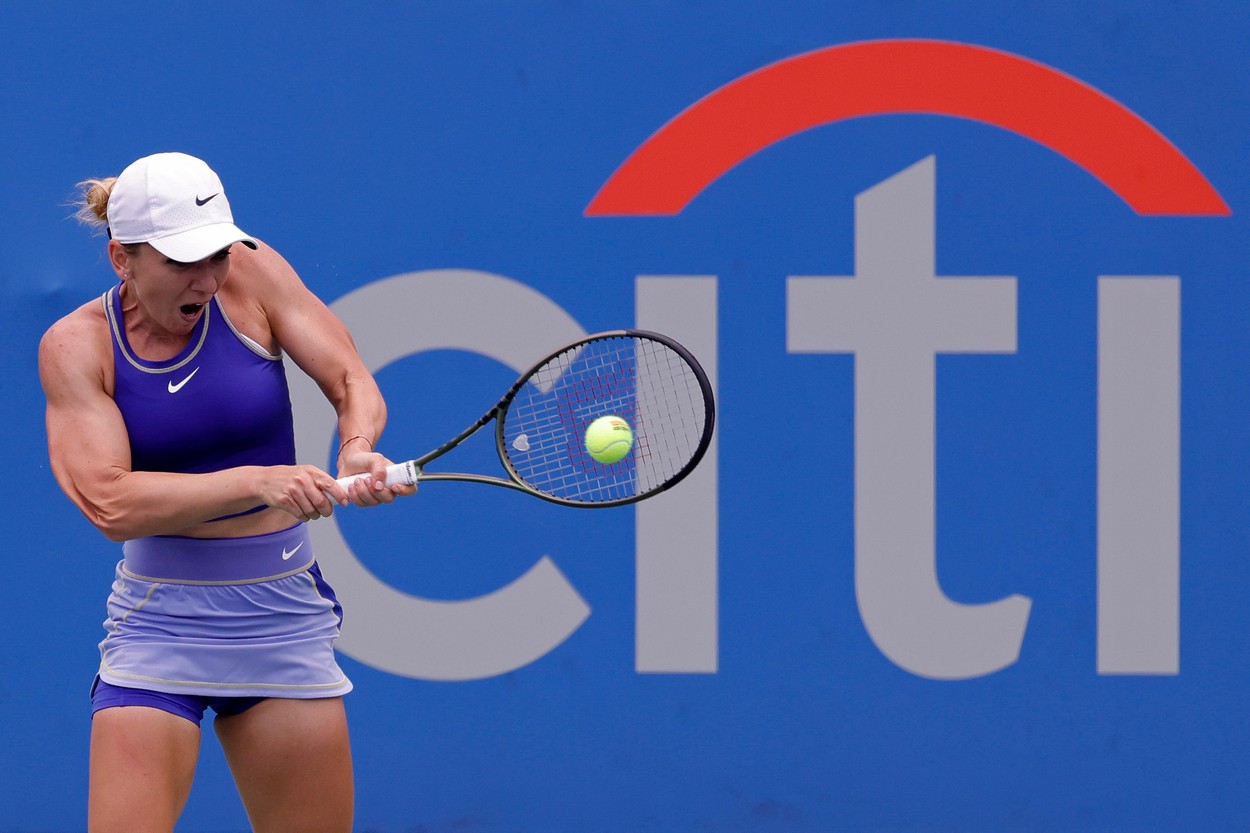 Aug 1, 2022; Washington, DC, USA; Simona Halep (ROU) hits a backhand against Cristina Busca (ESP)(not pictured) on day one of the Citi Open at Rock Creek Park Tennis Center.,Image: 711257300, License: Rights-managed, Restrictions: *** World Rights ***, Model Release: no