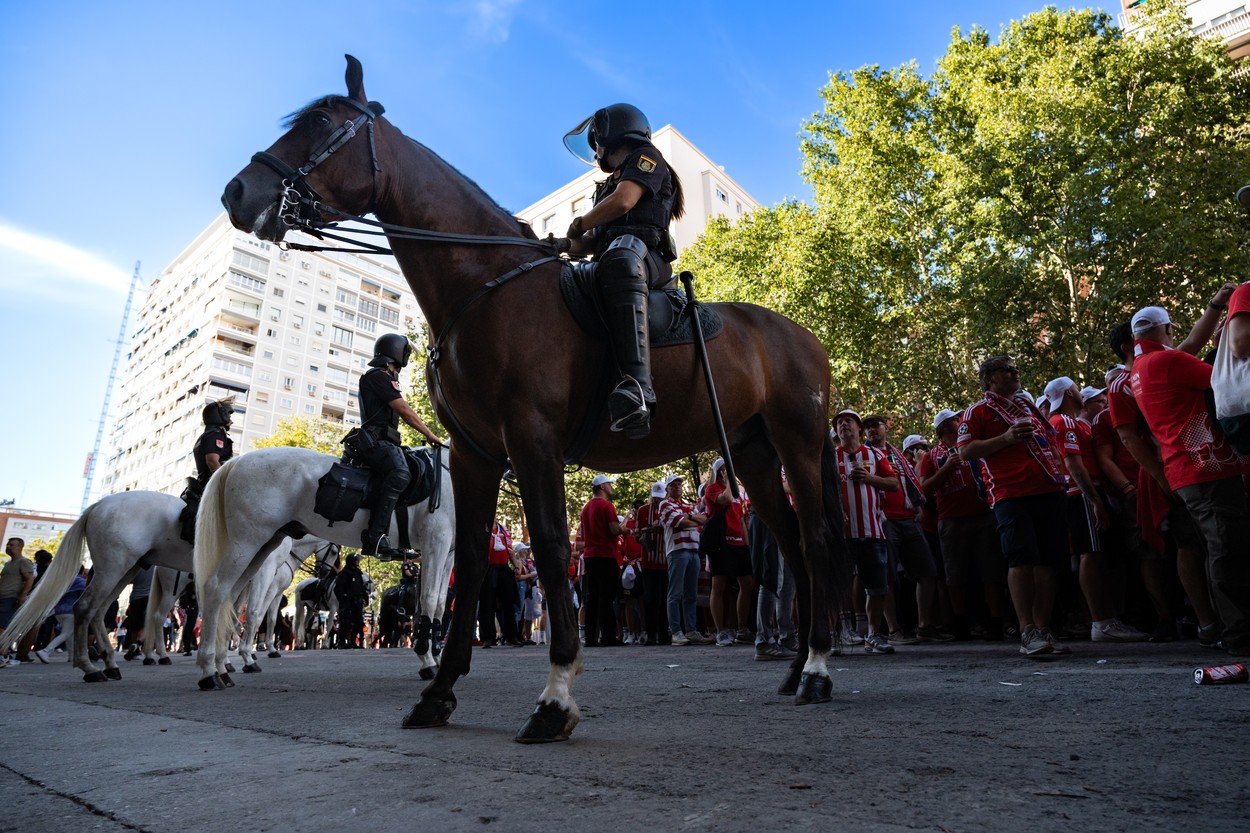 Police officers on horseback in front of dozens of FC Union Berlin fans on the Paseo de la Castellana on September 20, 2023 in Madrid, Spain. Around 4,400 German fans are expected to arrive in the capital for the Champions League match between Real Madrid and Union Berlin, which will take place today at 6:45 pm. The Government Delegation has deployed an operation in which about 1,700 agents of the National Police, the Municipal Police, SAMUR-Civil Protection, Firefighters, members of the Red Cross and security guards of the Madrid soccer club will participate to ensure security during the match.
SEPTEMBER 20;2023

09/20/2023,Image: 806864794, License: Rights-managed, Restrictions: , Model Release: no