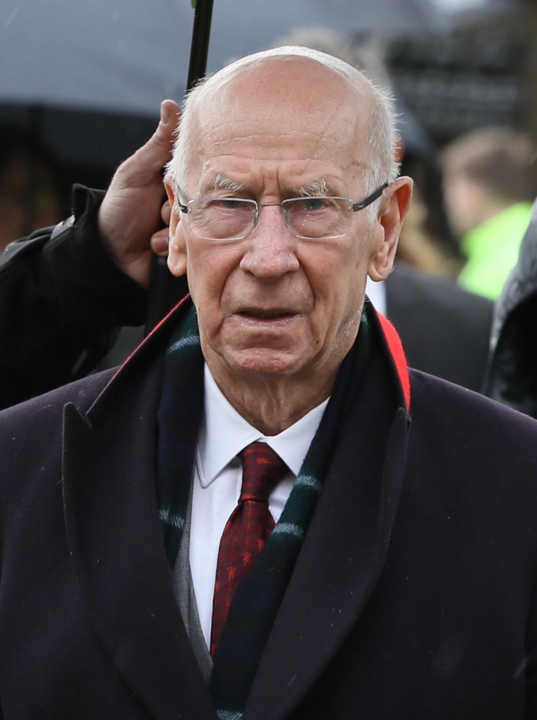 FILED - 01 November 2020, Northern Ireland, Coelraine: Sir Bobby Charlton attends the funeral of former Northern Irish footballer Harry Gregg. Sir Charlton, the 1966 World Cup winner, has been diagnosed with dementia, his wife Norma confirmed in an interview published on Sunday. Photo: Brian Lawless/PA Wire/dpa