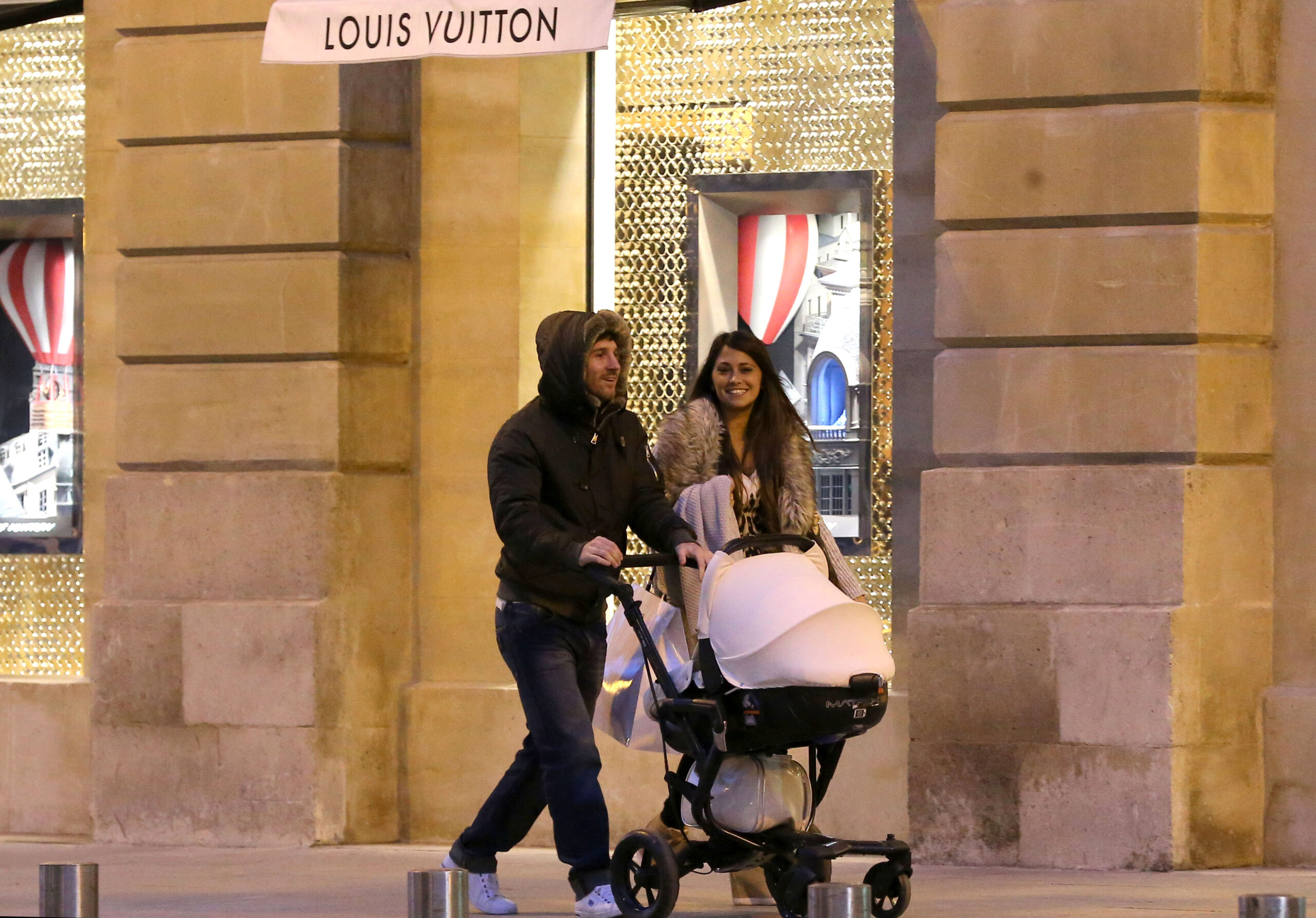 EXCLUSIVE - Argentina and Barcelona soccer player Lionel Messi and his girlfriend Antonella Rocuzzo are spotted strolling with their baby son Thiago in Paris, France on February 11, 2013. Photo by ABACAPRESS.COM
