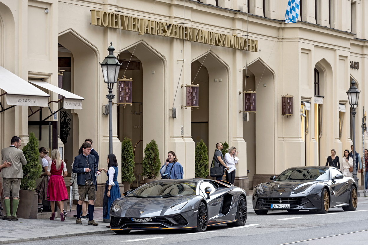 Parked Lamborghini Aventador and Ferrari F12 Berlinetta sports cars in front of Hotel Vier Jahreszeiten Kempinski, Maximilianstraße, Munich, Upper Bavaria, Bavaria, Germany,Image: 653608530, License: Rights-managed, Restrictions: , Model Release: no