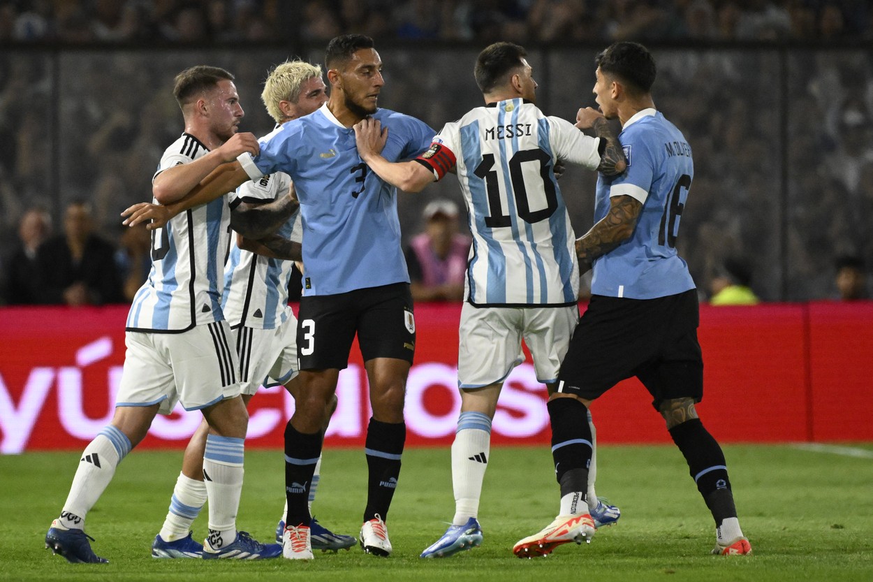 (L to R) Argentina's midfielder Alexis Mac Allister, midfielder Rodrigo De Paul, Uruguay's defender Sebastian Caceres, Argentina's forward Lionel Messi, and Uruguay's defender Mathias Olivera argue during the 2026 FIFA World Cup South American qualification football match between Argentina and Uruguay at La Bombonera stadium in Buenos Aires on November 16, 2023.,Image: 822525905, License: Rights-managed, Restrictions: , Model Release: no