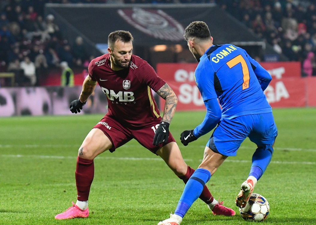 Florinel Coman and Vasile Mogos are in action during the CFR Cluj vs FCSB match at Dr. Constantin Radulescu Stadium in Cluj-Napoca, Romania, on December 10, 2023.
CFR Cluj v FCSB - SuperLiga, Cluj-Napoca, Romania - 10 Dec 2023,Image: 828770098, License: Rights-managed, Restrictions: , Model Release: no