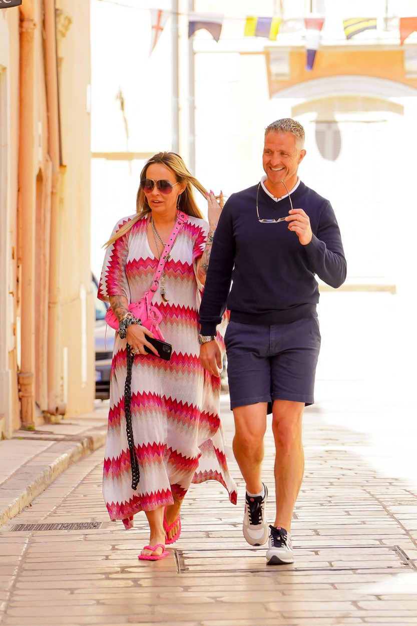 EXCLUSIVE: Former F1 star Ralf Schumacher and ex-wife Cora stroll arm-in-arm through St Tropez - sparking speculation they have reunited eight years after their bitter divorce. The pair appeared to be enjoying each other’s company, looking happy and relaxed and even stopping at a bar to enjoy a glass of champagne. Former actress and model Cora, who celebrated her divorce from the younger brother of F1 legend Michael by posing for the German edition of Playboy, was casually dressed in a long, loose-fitting, pink and white striped dress and flip flops. Ralf, once linked to glamour model Katie Price, looked sporty in a blue top, shorts and sneakers. The couple, who have one son David, now 21, originally got together in 2001. Their church wedding took place at the Maria Plain church in Salzburg, Austria the following September. When their marriage ended after 13 years, they fought a bitter battle over the former Williams and Toyota driver’s €100 million fortune, and homes in Germany, Austria and France. Ralf, 47, reportedly handed over a huge chunk of his Formula One fortune to end the union. Cora, 48, was subjected to a storm of abuse on social media websites, accused of being a goldigger who only married him for his money. Ralf, who retired from motorsport in 2012, was said to have been estranged from her for some time before the final break.
25 Apr 2023,Image: 775763061, License: Rights-managed, Restrictions: ONLY Australia, Canada, Croatia, Denmark, Egypt, Greece, India, Ireland, Israel, Italy, Japan, Jordan, Lebanon, Lithuania, New Zealand, Norway, Poland, Qatar, Romania, Saudi Arabia, Singapore, Slovakia, Slovenia, South Africa, South Korea, Taiwan, Thailand, Model Release: no, Pictured: Ralf Schumacher and his former wife Cora