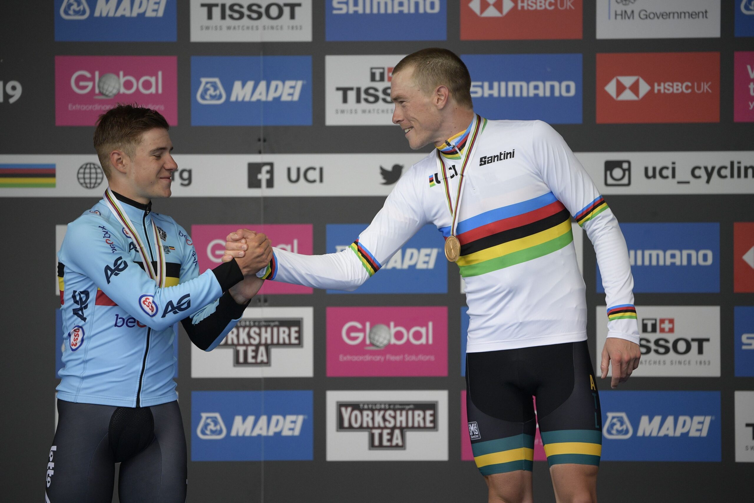 September 25, 2019, Harrogate, United Kingdom: Belgian Remco Evenepoel , winner of the silver medal and Australian Rohan Dennis of Bahrain-Merida , winner of the gold medal celebrate on the podium of the Men Elite Individual Time Trial at the UCI Road World Championships cycling in Harrogate, North Yorkshire, United Kingdom, Wednesday 25 September 2019. The Worlds are taking place from 21 to 29 September. (Credit Image: © Yorick Jansens/Belga via ZUMA Press)