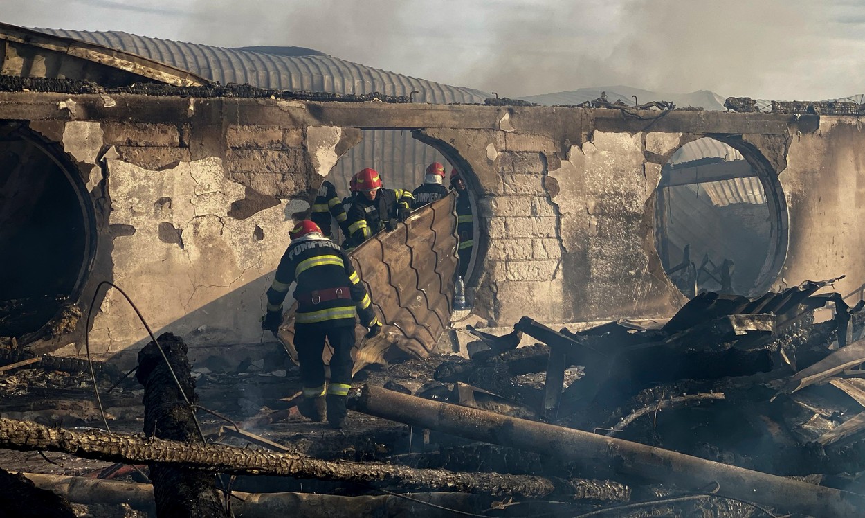This handout photo taken and made available by the Inspectorate of Emergency Situations Prahova (ISU Prahova) on December 26, 2023 shows firefighters working to extinguish a fire at the site of teh 'Ferma Dacilor' guest house in Tohani, Romania.  At least one child and two adults were found charred by firefighters and ambulance crews who intervened in the morning of December 26 at the fire that broke out at the 'Ferma Dacilor' boarding house, according to the ISU Prahova. The flames that engulfed the guest house in Tohani, in Prahova county, spread over an area of approximately one thousand square meters. ISU has activated the red emergency plan and is responding with at least 50 firefighters.,Image: 832319115, License: Rights-managed, Restrictions: RESTRICTED TO EDITORIAL USE - MANDATORY CREDIT 