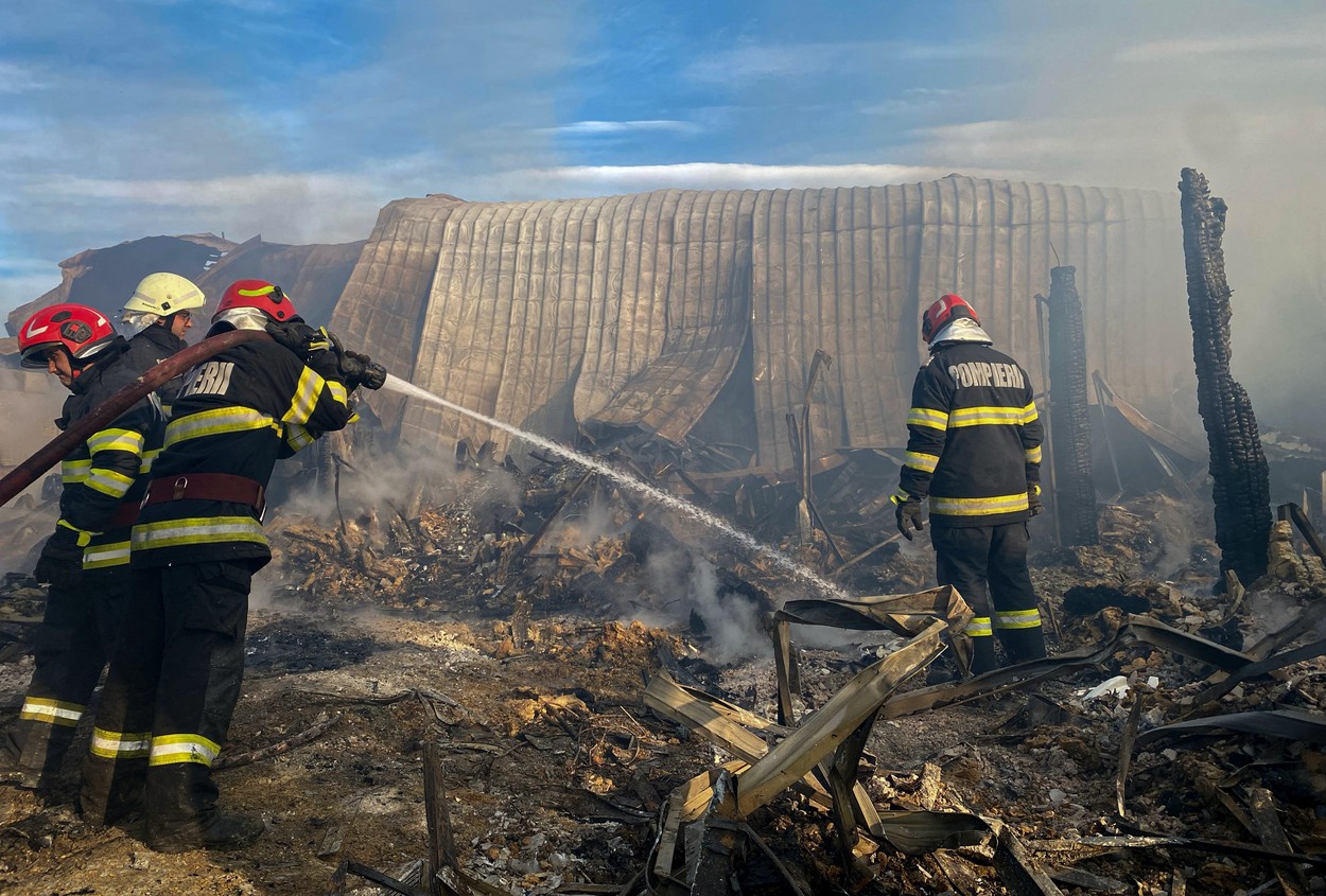 This handout photo taken and made available by the Inspectorate of Emergency Situations Prahova (ISU Prahova) on December 26, 2023 shows firefighters working to extinguish a fire at the site of teh 'Ferma Dacilor' guest house in Tohani, Romania.  At least one child and two adults were found charred by firefighters and ambulance crews who intervened in the morning of December 26 at the fire that broke out at the 'Ferma Dacilor' boarding house, according to the ISU Prahova. The flames that engulfed the guest house in Tohani, in Prahova county, spread over an area of approximately one thousand square meters. ISU has activated the red emergency plan and is responding with at least 50 firefighters.,Image: 832319449, License: Rights-managed, Restrictions: RESTRICTED TO EDITORIAL USE - MANDATORY CREDIT 