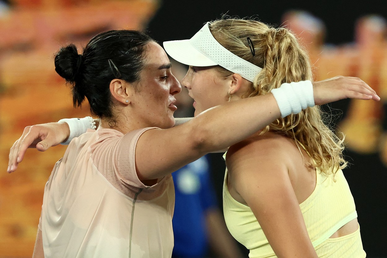 Russia's Mirra Andreeva (R) hugs Tunisia's Ons Jabeur after their women's singles match on day four of the Australian Open tennis tournament in Melbourne on January 17, 2024.,Image: 837863354, License: Rights-managed, Restrictions: -- IMAGE RESTRICTED TO EDITORIAL USE - STRICTLY NO COMMERCIAL USE --, Model Release: no