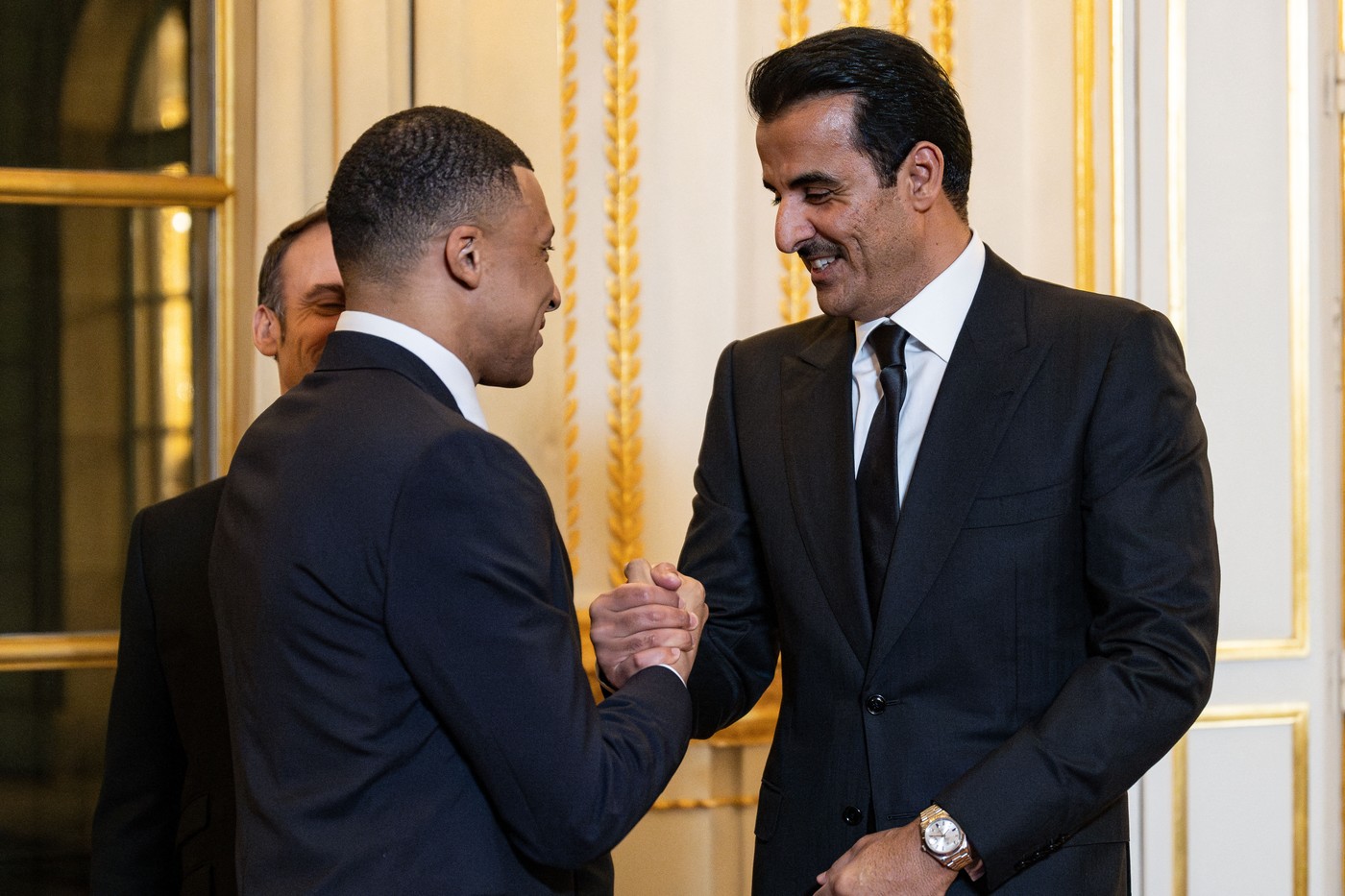 Kylian Mbappe and Qatar s Emir Sheikh Tamim bin Hamad al-Thani at an official dinner on the sidelines of the state visit of Emir of Qatar Sheikh Tamim bin Hamad Al Thani at the Elysee Palace in Paris, France on February 27, 2024.,Image: 851708624, License: Rights-managed, Restrictions: , Model Release: no