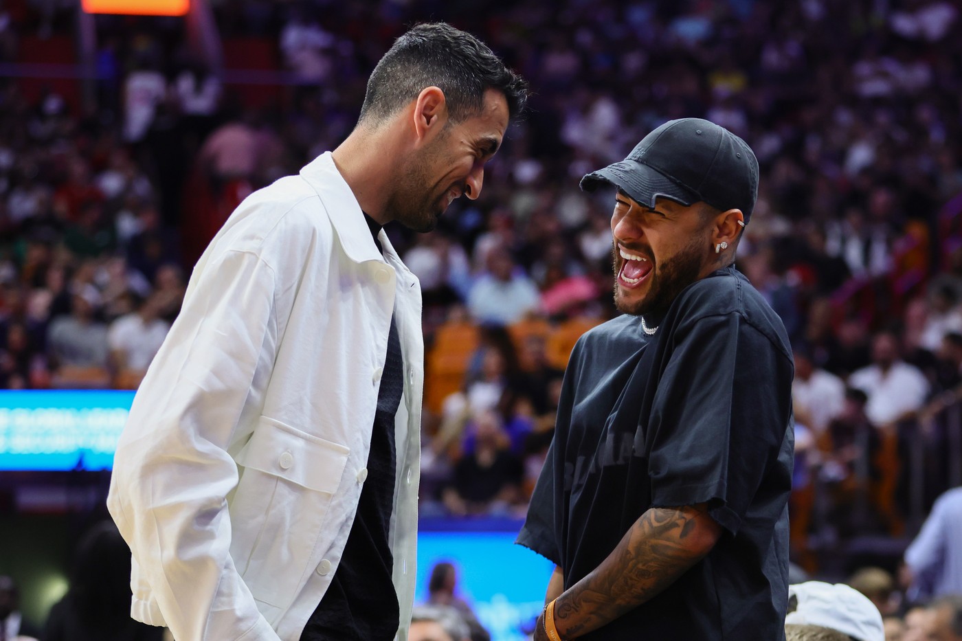 Mar 26, 2024; Miami, Florida, USA; Inter Miami CF midfielder Sergio Busquets and Brazilian soccer player Neymar Jr. attend the game between the Miami Heat and the Golden State Warriors at Kaseya Center.,Image: 859905904, License: Rights-managed, Restrictions: , Model Release: no