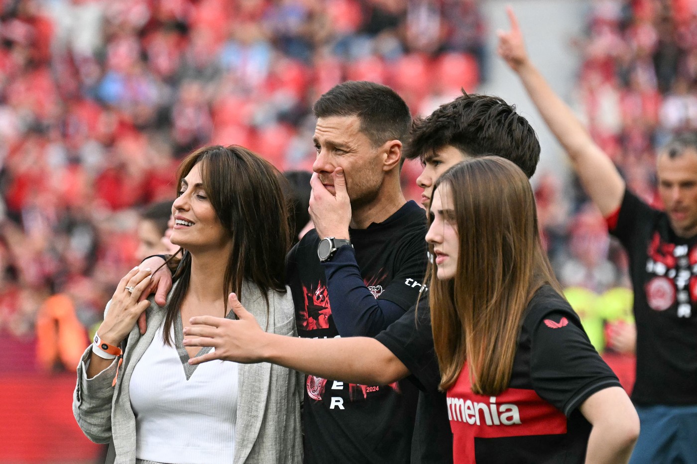 Bayer Leverkusen's Spanish head coach Xabi Alonso celebrate with family members after the German first division Bundesliga football match between Bayer 04 Leverkusen and FC Augsburg in Leverkusen, western Germany on May 18, 2024.,Image: 874179761, License: Rights-managed, Restrictions: DFL REGULATIONS PROHIBIT ANY USE OF PHOTOGRAPHS AS IMAGE SEQUENCES AND/OR QUASI-VIDEO, Model Release: no