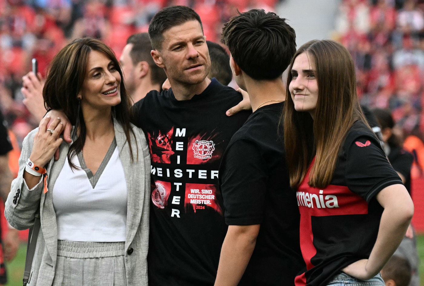 Bayer Leverkusen's Spanish head coach Xabi Alonso celebrate with family members after the German first division Bundesliga football match between Bayer 04 Leverkusen and FC Augsburg in Leverkusen, western Germany on May 18, 2024.,Image: 874179812, License: Rights-managed, Restrictions: DFL REGULATIONS PROHIBIT ANY USE OF PHOTOGRAPHS AS IMAGE SEQUENCES AND/OR QUASI-VIDEO, Model Release: no