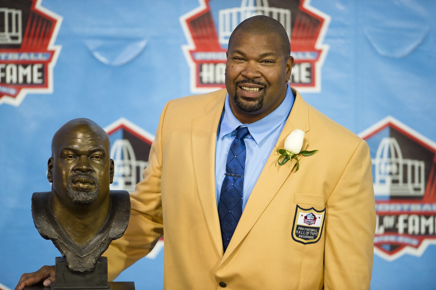 CANTON, OH - AUGUST 3: Former offensive lineman Larry Allen of the Dallas Cowboys poses with his Hall of Fame bust during the NFL Class of 2013 Enshrinement Ceremony at Fawcett Stadium on Aug. 3, 2013 in Canton, Ohio.,Image: 167742950, License: Rights-managed, Restrictions: , Model Release: no