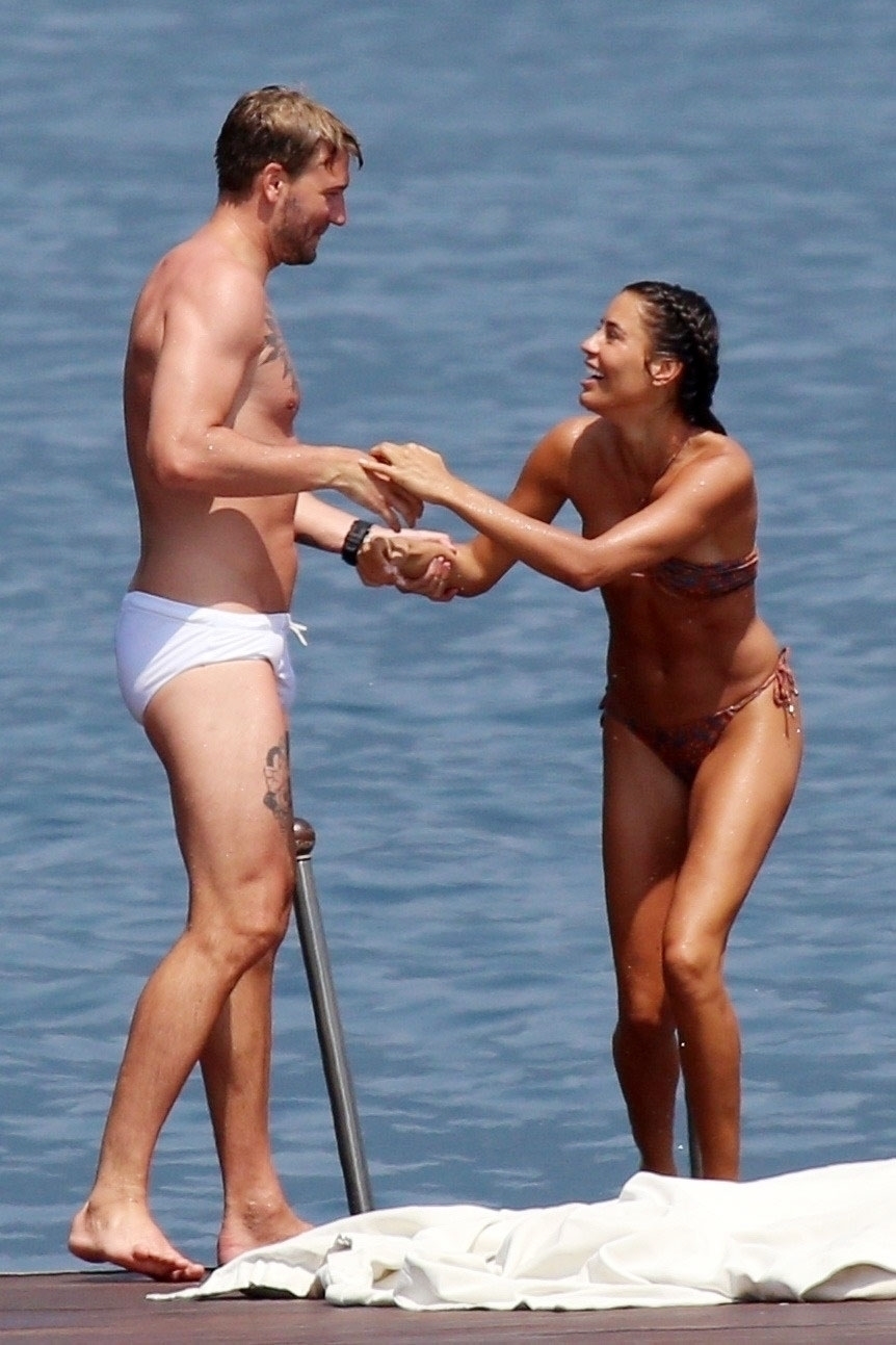 TREMEZZO, ITALY  - *EXCLUSIVE*  - Danish professional footballer Nicklas Bendtner and his girlfriend Philine Roepstorff have some fun in the sun as they enjoy a break in Tremezzo, Italy.

PICS TAKEN: 10/07/2020

BACKGRID UK 11 JULY 2020,Image: 541960629, License: Rights-managed, Restrictions: RIGHTS: WORLDWIDE EXCEPT IN ITALY, Model Release: no, Pictured: Nicklas Bendtner, Philine Roepstorff