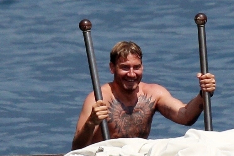 TREMEZZO, ITALY  - *EXCLUSIVE*  - Danish professional footballer Nicklas Bendtner and his girlfriend Philine Roepstorff have some fun in the sun as they enjoy a break in Tremezzo, Italy.

PICS TAKEN: 10/07/2020

BACKGRID UK 11 JULY 2020,Image: 541960661, License: Rights-managed, Restrictions: RIGHTS: WORLDWIDE EXCEPT IN ITALY, Model Release: no, Pictured: Nicklas Bendtner