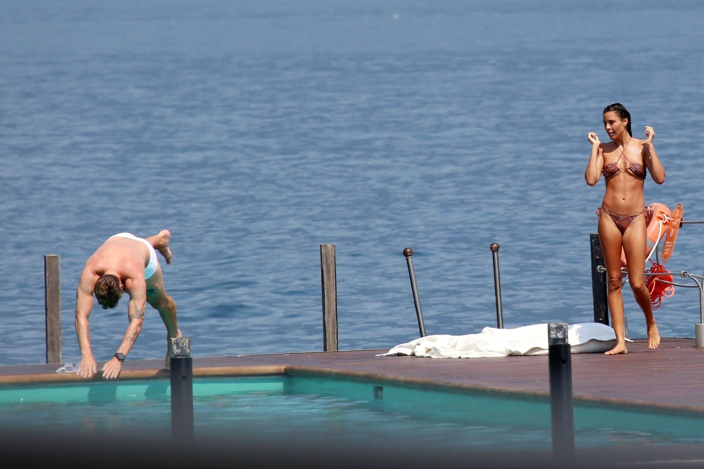 TREMEZZO, ITALY  - *EXCLUSIVE*  - Danish professional footballer Nicklas Bendtner and his girlfriend Philine Roepstorff have some fun in the sun as they enjoy a break in Tremezzo, Italy.

PICS TAKEN: 10/07/2020

BACKGRID UK 11 JULY 2020,Image: 541960668, License: Rights-managed, Restrictions: RIGHTS: WORLDWIDE EXCEPT IN ITALY, Model Release: no, Pictured: Nicklas Bendtner, Philine Roepstorff