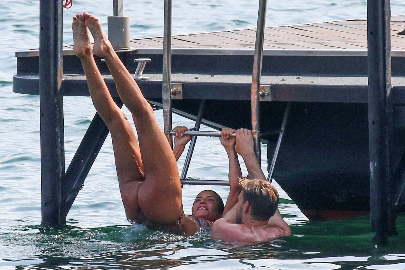 TREMEZZO, ITALY  - *EXCLUSIVE*  - Danish professional footballer Nicklas Bendtner and his girlfriend Philine Roepstorff have some fun in the sun as they enjoy a break in Tremezzo, Italy.

PICS TAKEN: 10/07/2020

BACKGRID UK 11 JULY 2020,Image: 541960705, License: Rights-managed, Restrictions: RIGHTS: WORLDWIDE EXCEPT IN ITALY, Model Release: no, Pictured: Nicklas Bendtner, Philine Roepstorff