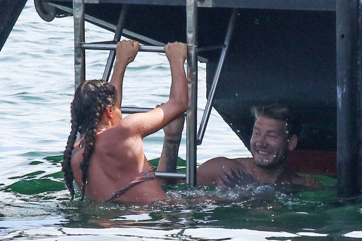 TREMEZZO, ITALY  - *EXCLUSIVE*  - Danish professional footballer Nicklas Bendtner and his girlfriend Philine Roepstorff have some fun in the sun as they enjoy a break in Tremezzo, Italy.

PICS TAKEN: 10/07/2020

BACKGRID UK 11 JULY 2020,Image: 541960721, License: Rights-managed, Restrictions: RIGHTS: WORLDWIDE EXCEPT IN ITALY, Model Release: no, Pictured: Nicklas Bendtner, Philine Roepstorff